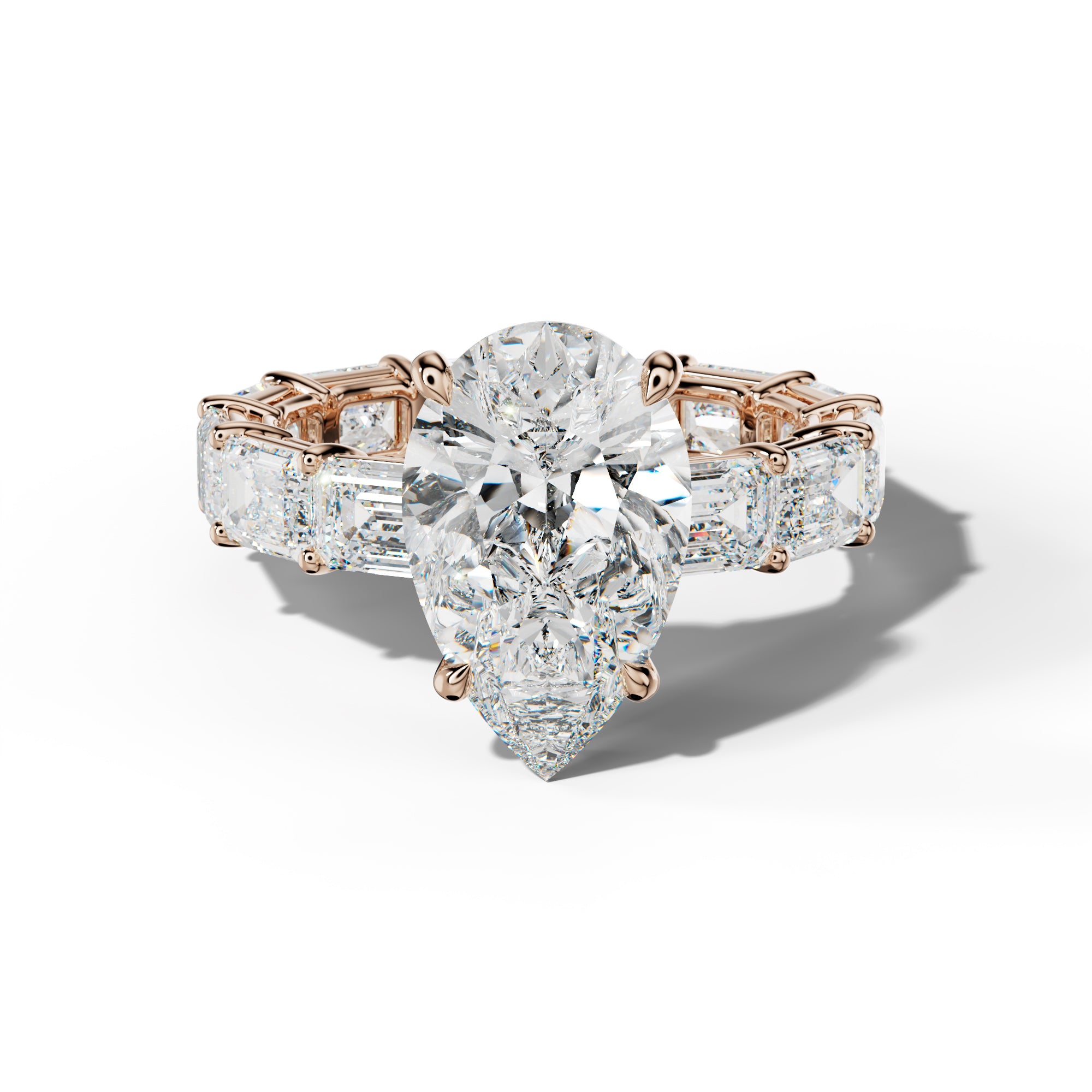 Miracle Pear Shape Engagement Ring With East West Emerald Cut Side Stones