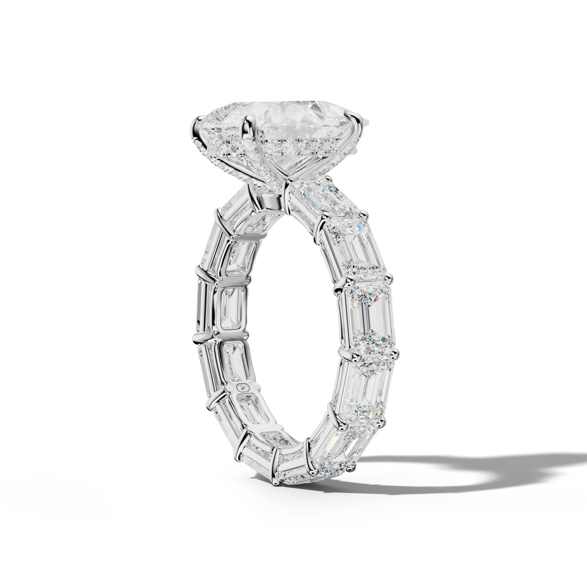 Miracle Pear Shape Engagement Ring With East West Emerald Cut Side Stones