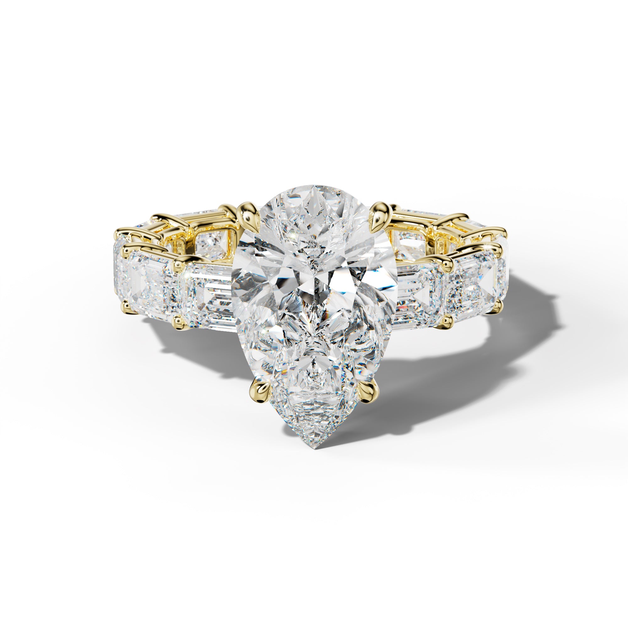 Miracle Pear Shape Engagement Ring With East West Emerald Cut Side Stones