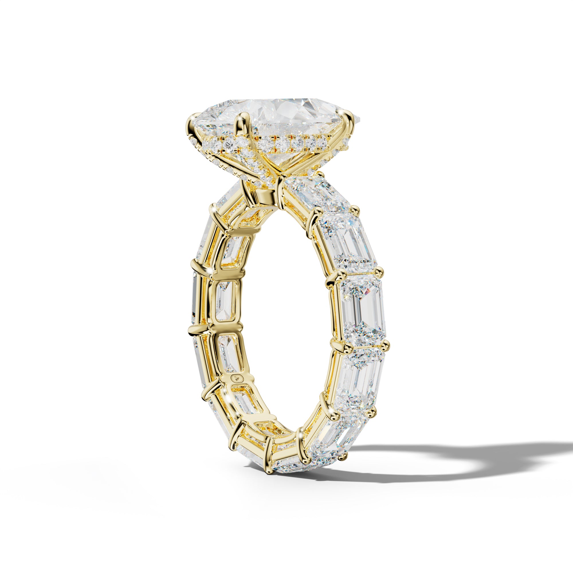 Miracle Pear Shape Engagement Ring With East West Emerald Cut Side Stones