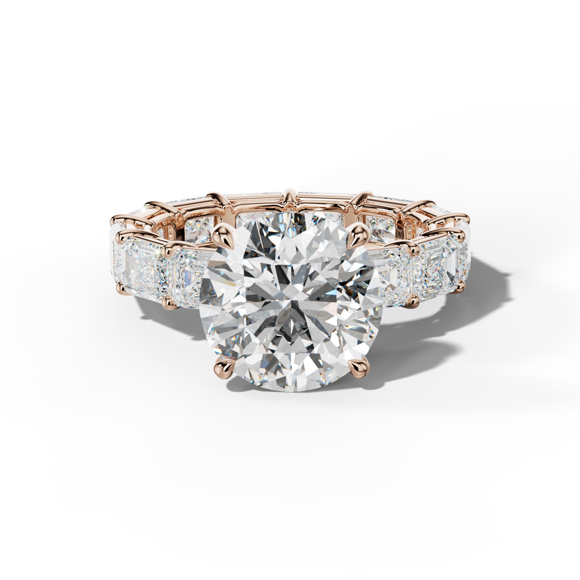 Miracle Round Diamond Engagement Ring With East West Emerald Cut Side Stones