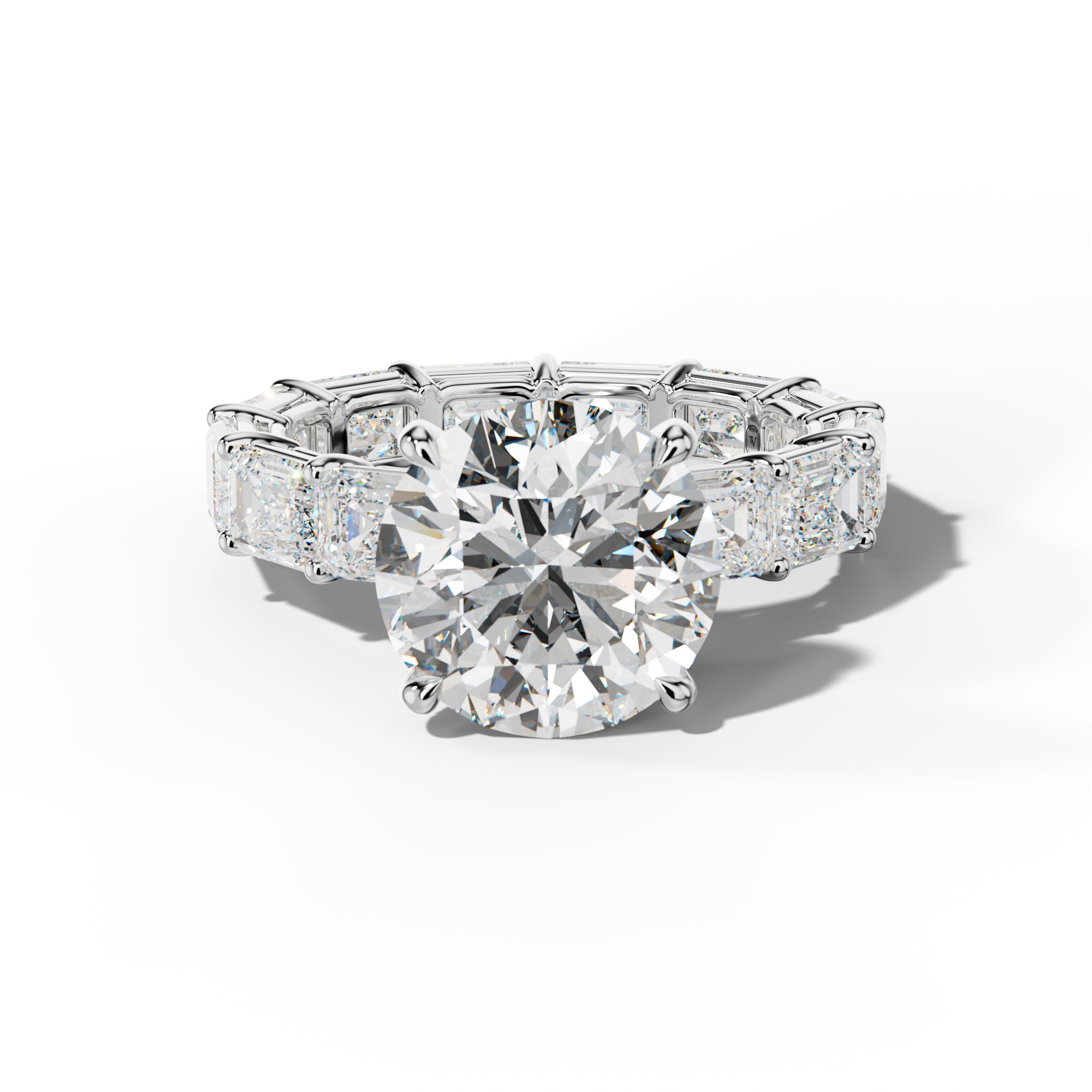Miracle Round Diamond Engagement Ring With East West Emerald Cut Side Stones