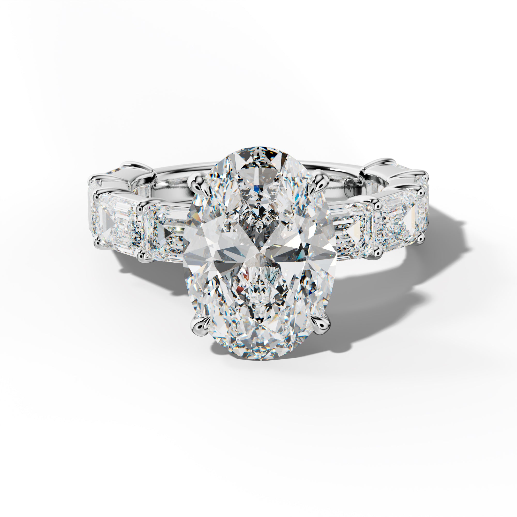 Adriana Oval Diamond Engagement Ring With East West Emerald Cut Side Stones
