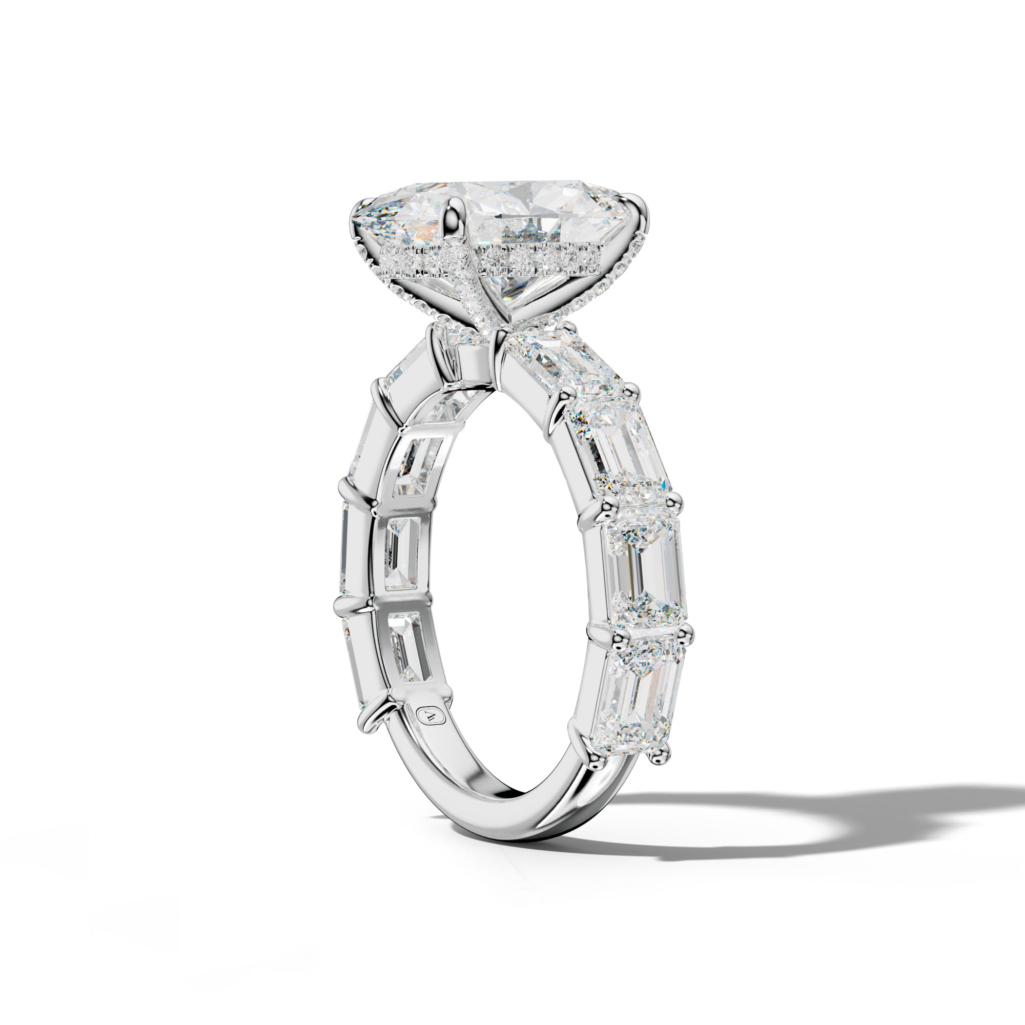 Adriana Oval Diamond Engagement Ring With East West Emerald Cut Side Stones