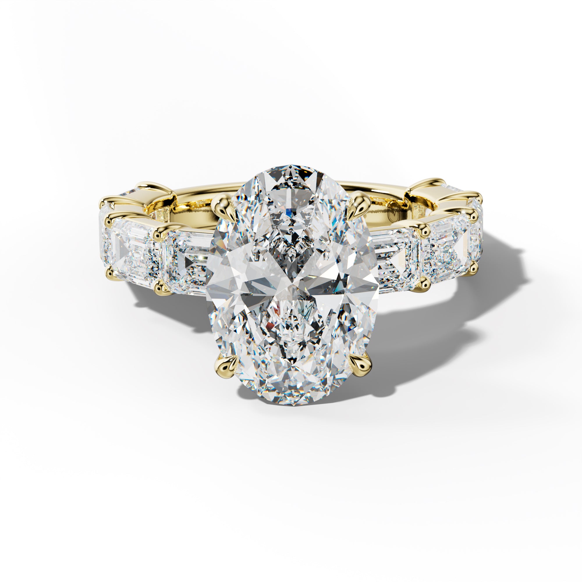 Adriana Oval Diamond Engagement Ring With East West Emerald Cut Side Stones