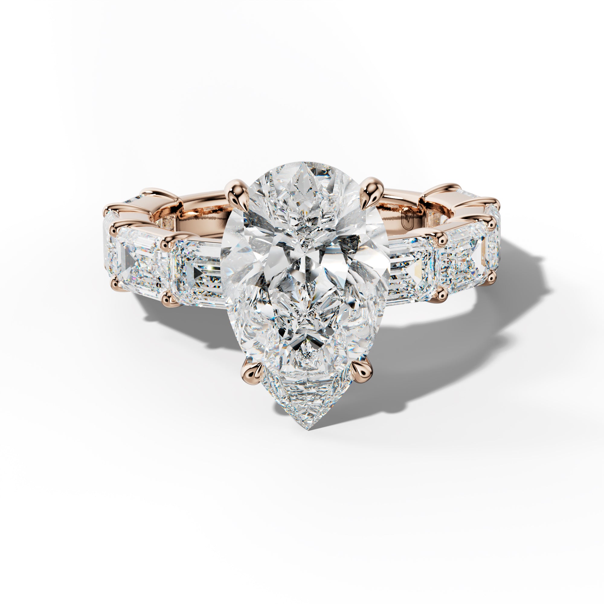 Adriana Pear Shape Engagement Ring With East West Emerald Cut Side Stones
