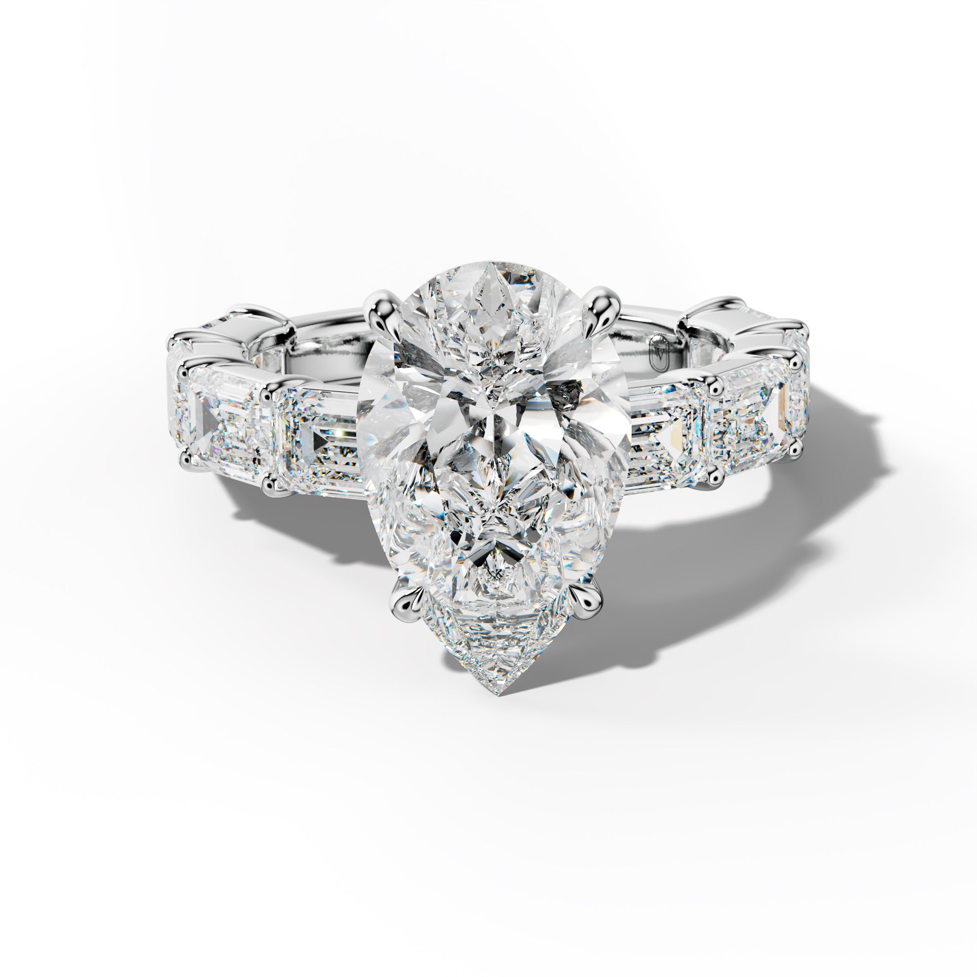 Adriana Pear Shape Engagement Ring With East West Emerald Cut Side Stones