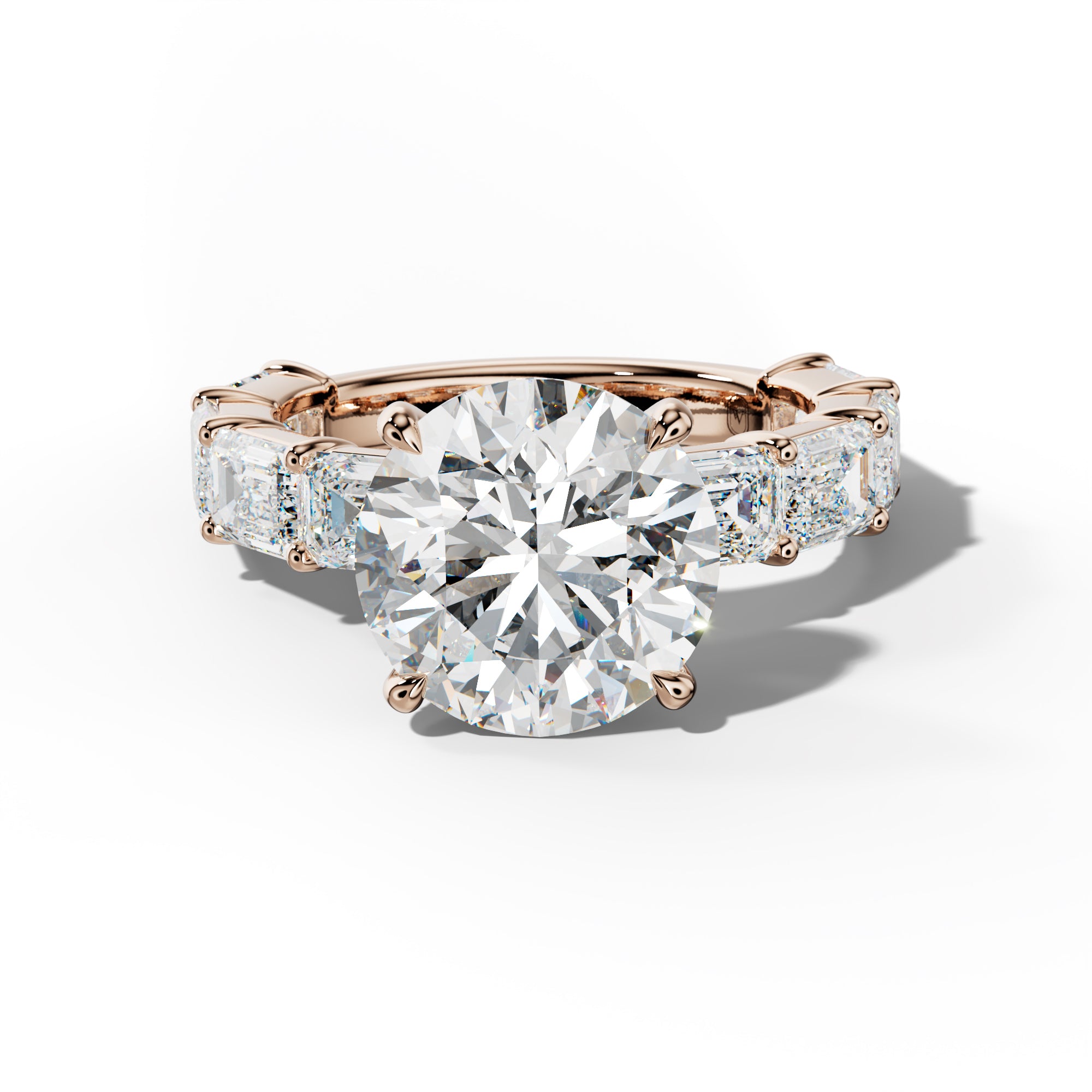 Adriana Round Diamond Engagement Ring With East West Emerald Cut Side Stones