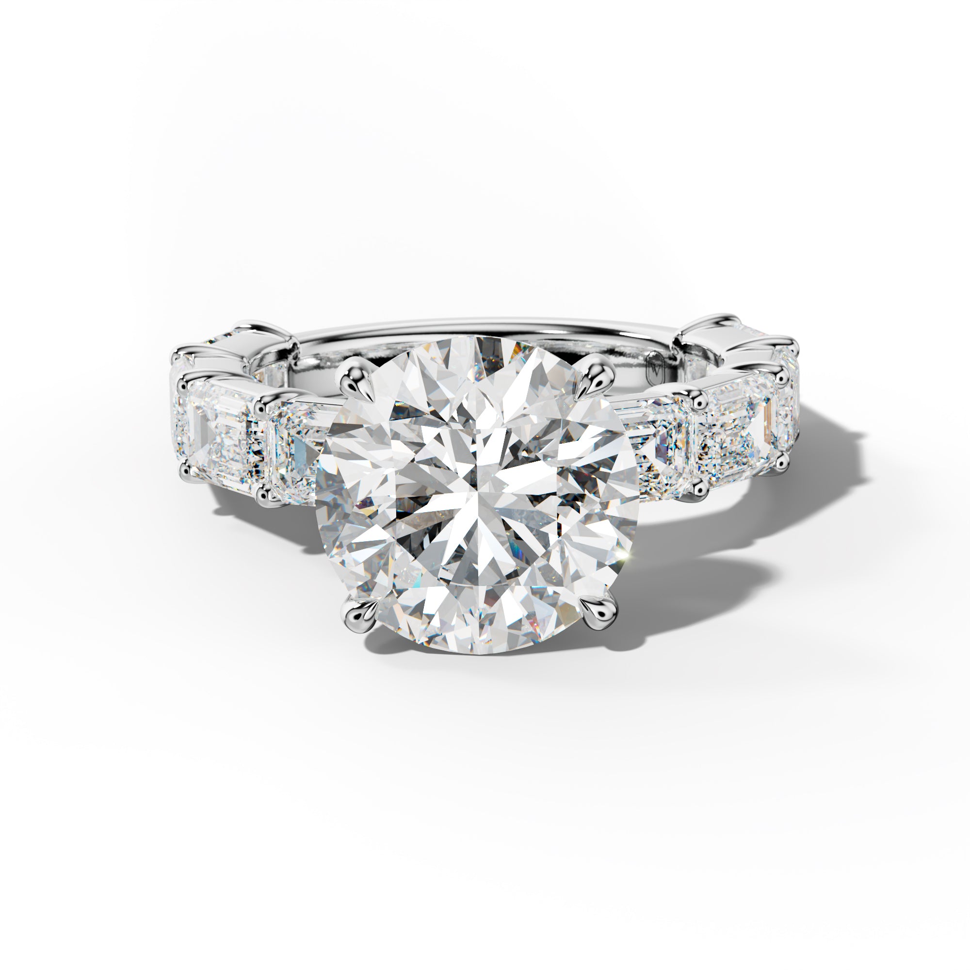 Adriana Round Diamond Engagement Ring With East West Emerald Cut Side Stones