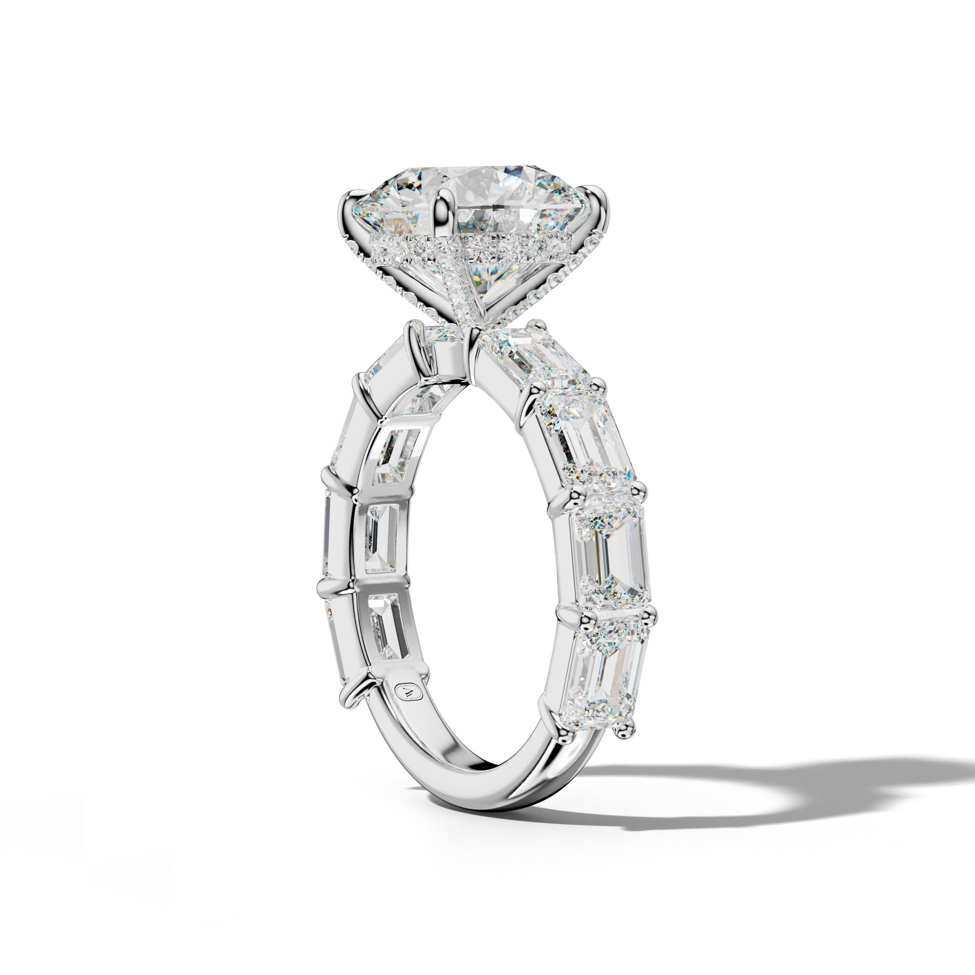 Adriana Round Diamond Engagement Ring With East West Emerald Cut Side Stones
