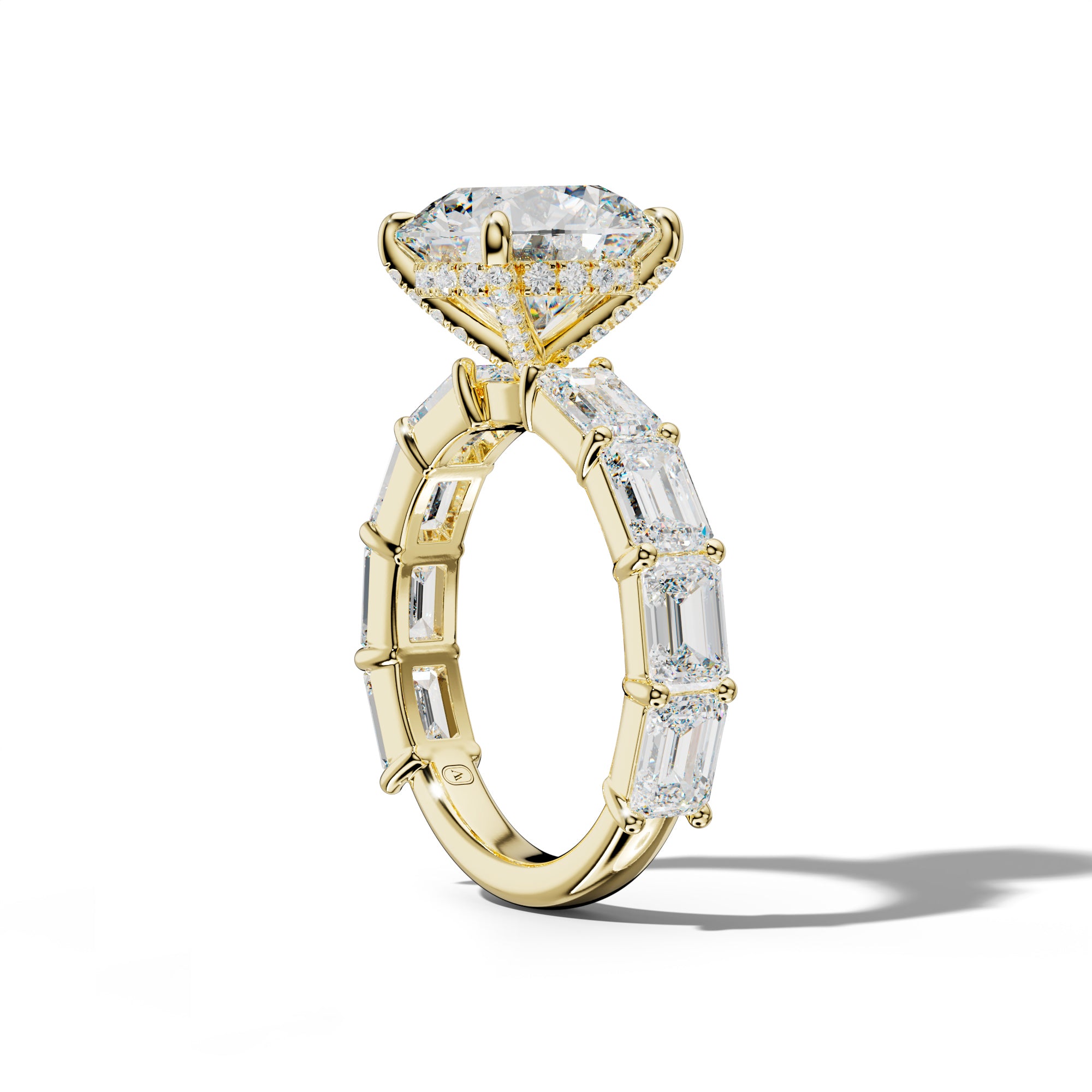 Adriana Round Diamond Engagement Ring With East West Emerald Cut Side Stones