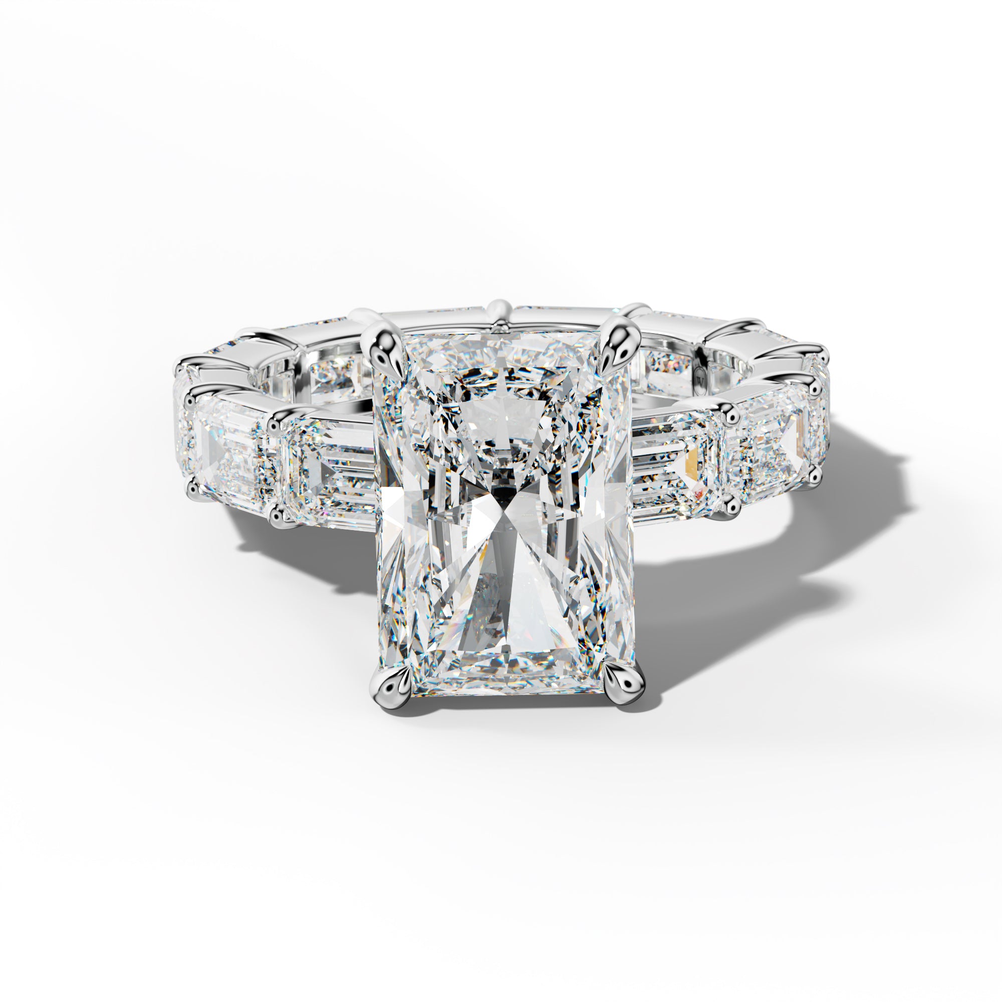 Romina Radiant Diamond Engagement Ring With East West Emerald Cut Side Stones