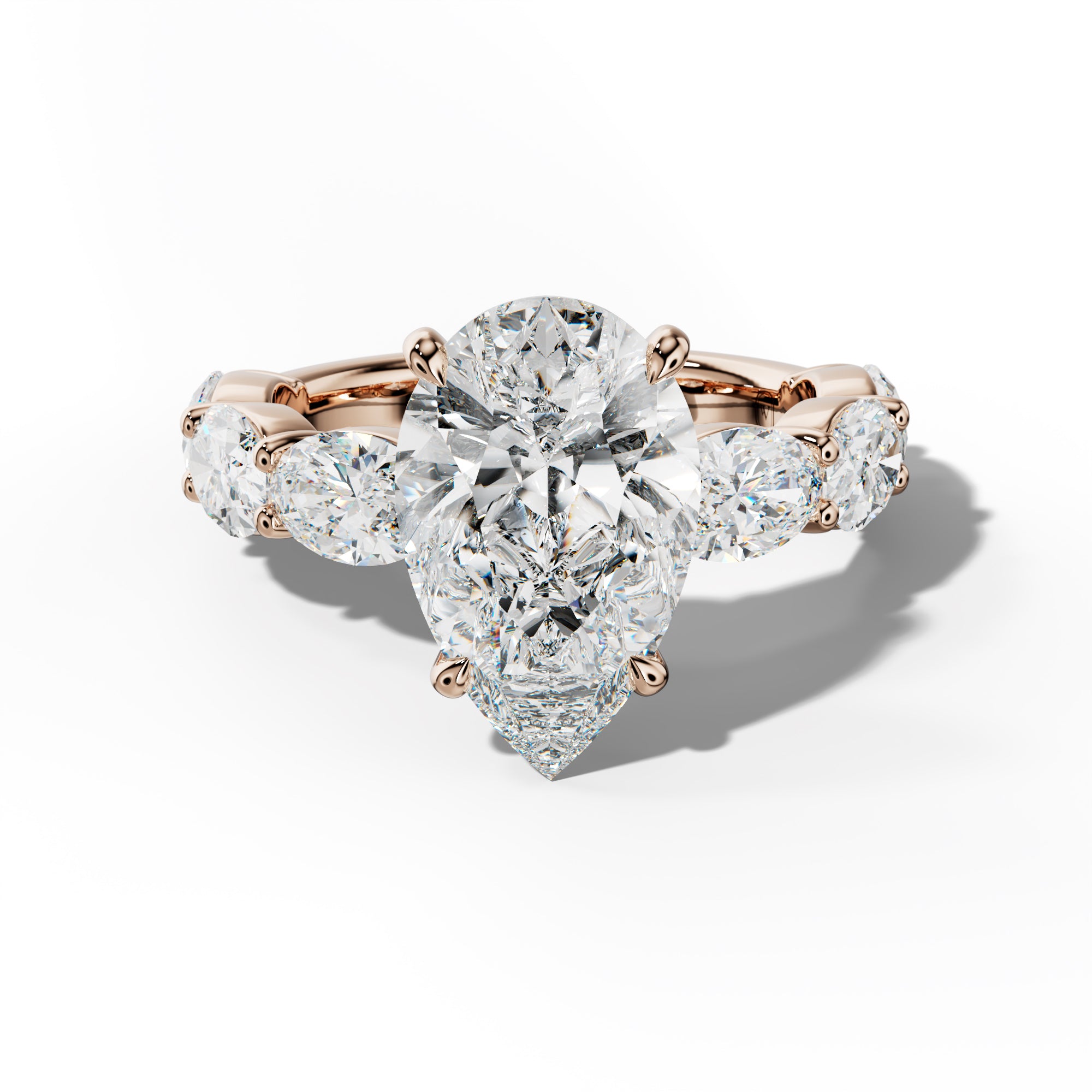 Katherine Pear Shape Engagement Ring With East West Oval Side Stones