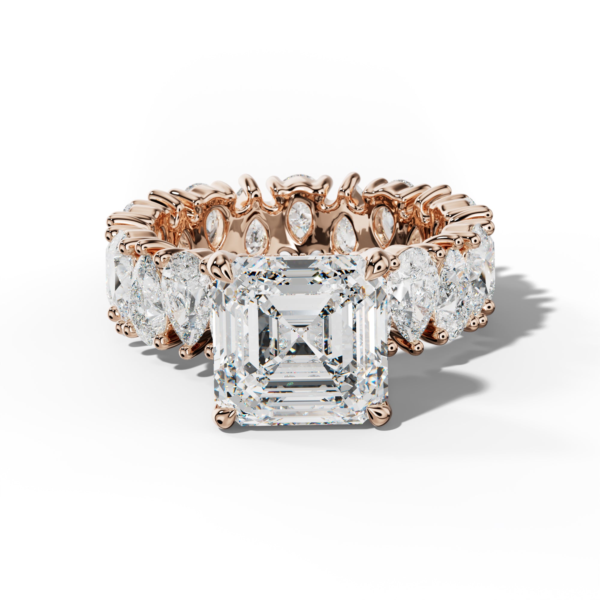 Livia Asscher Diamond Engagement Ring With Pear Shape Side Stones