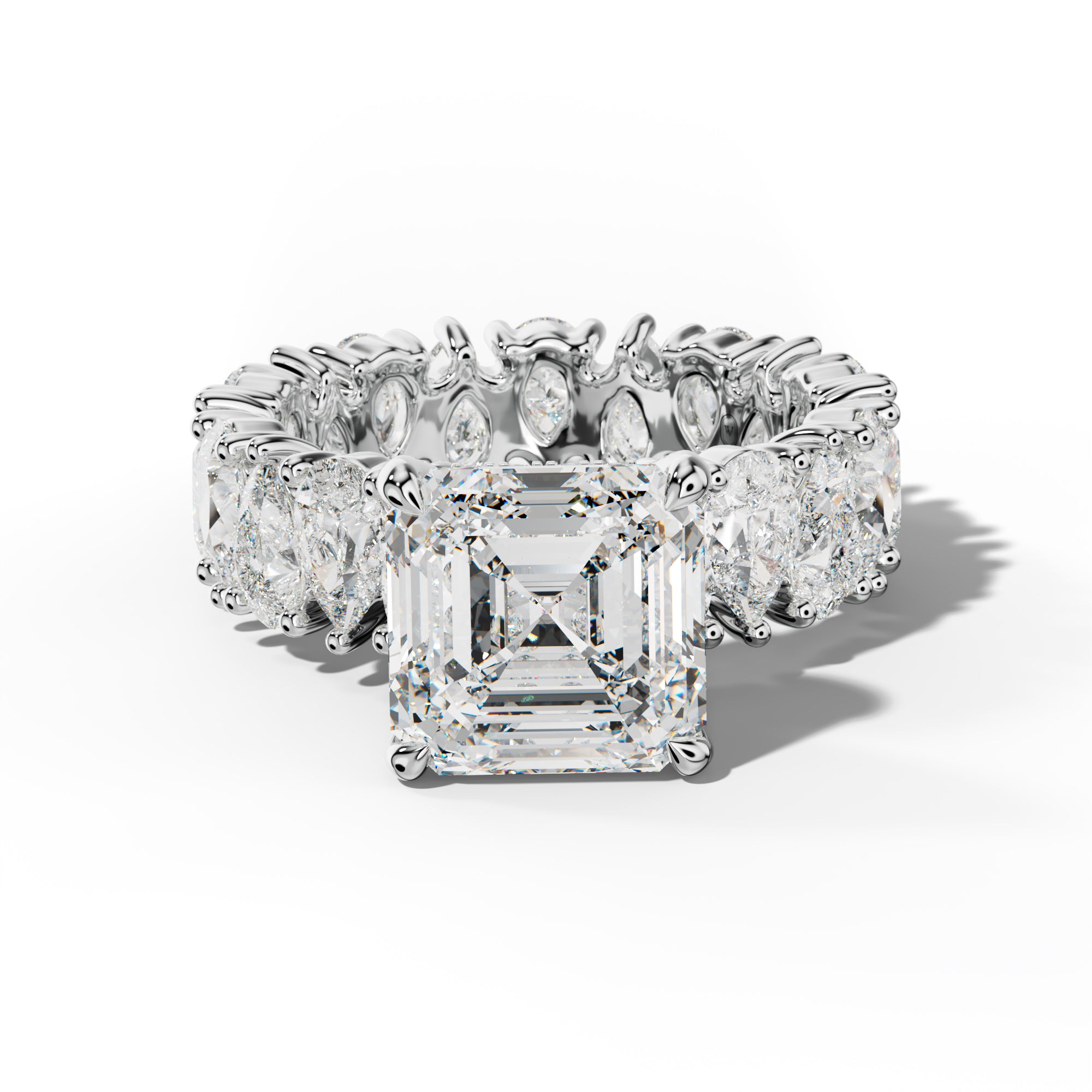 Livia Asscher Diamond Engagement Ring With Pear Shape Side Stones