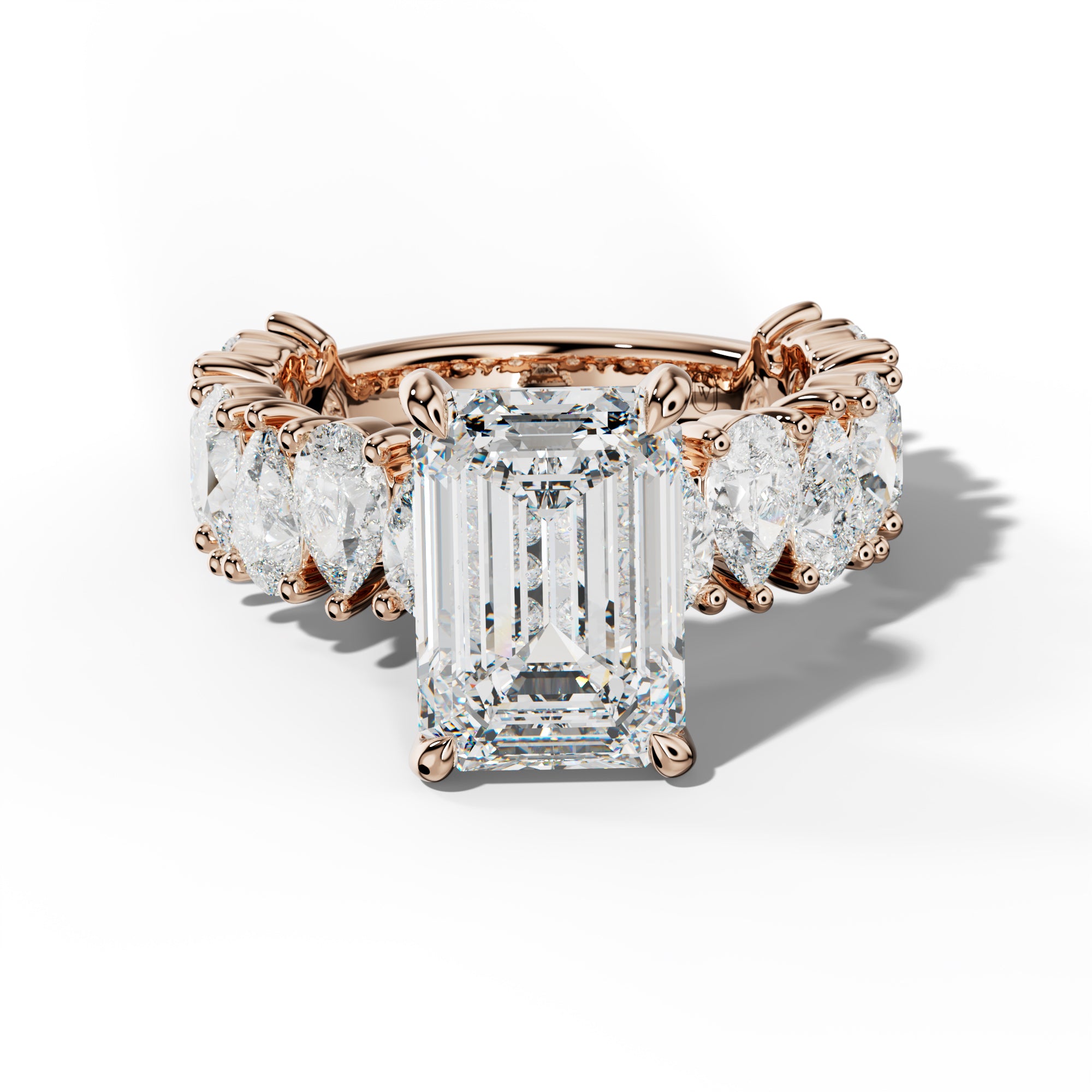 Paula Emerald Cut Engagement Ring With Pear Shape Side Stones