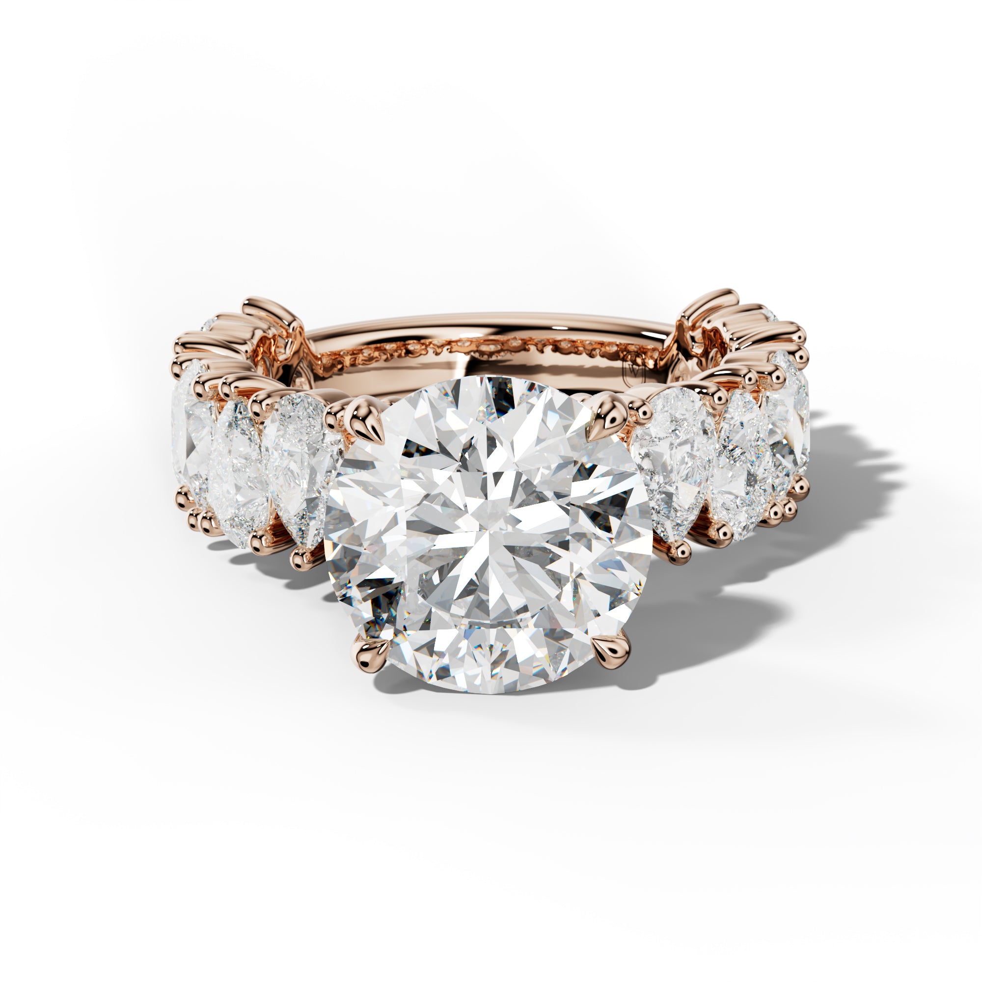 Paula Round Diamond Engagement Ring With Pear Shape Side Stones