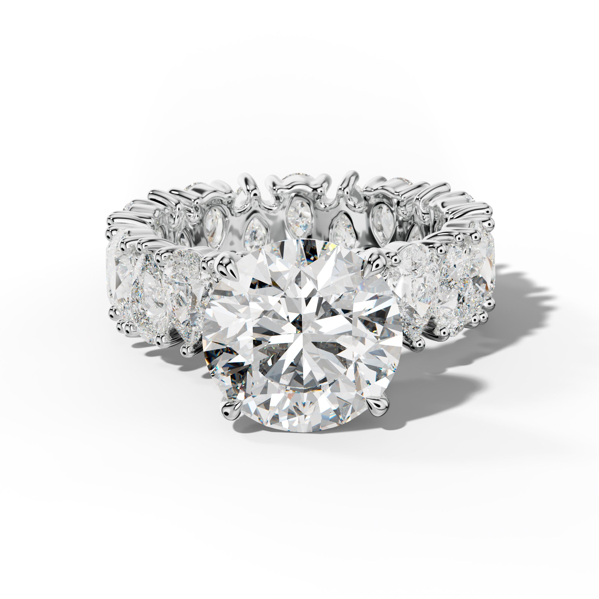 Livia Round Diamond Engagement Ring With Pear Shape Side Stones