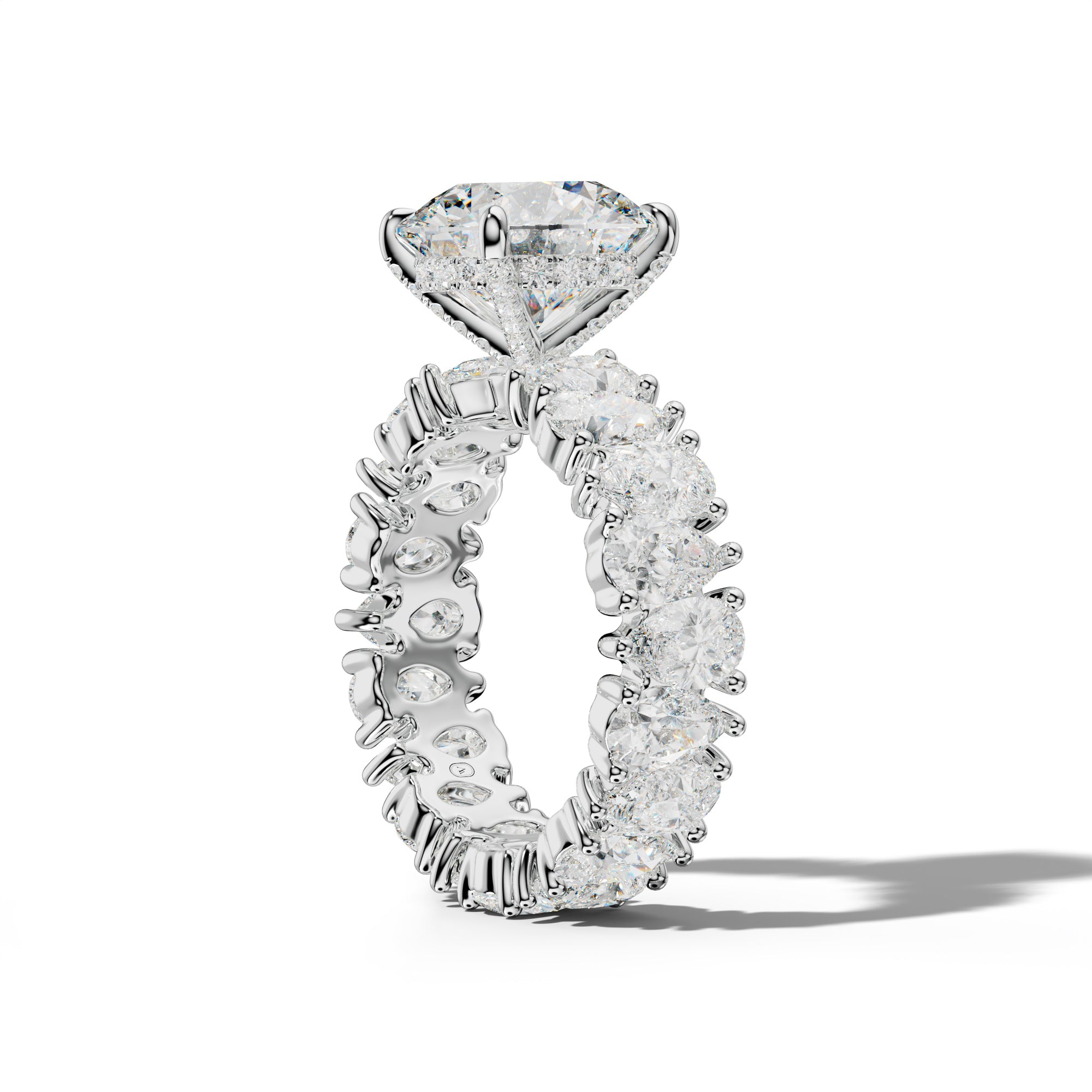 Livia Round Diamond Engagement Ring With Pear Shape Side Stones