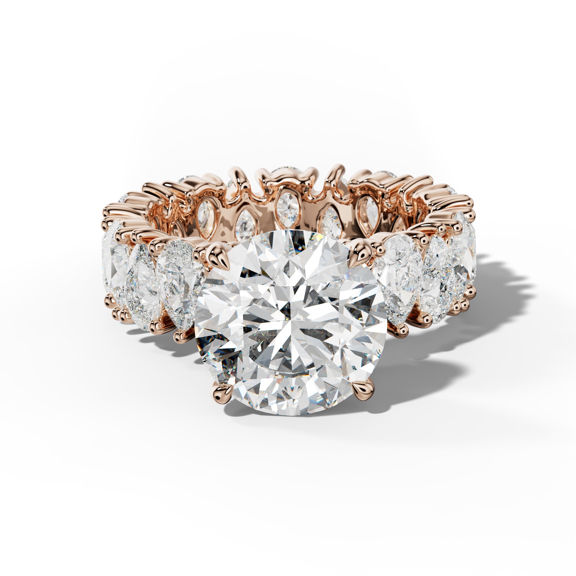 Livia Round Diamond Engagement Ring With Pear Shape Side Stones