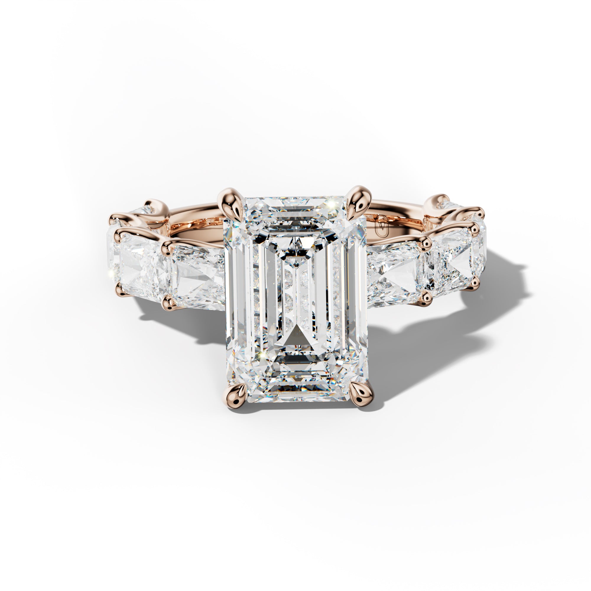 Nancy Emerald Cut Engagement Ring With East West Radiant Side Stones