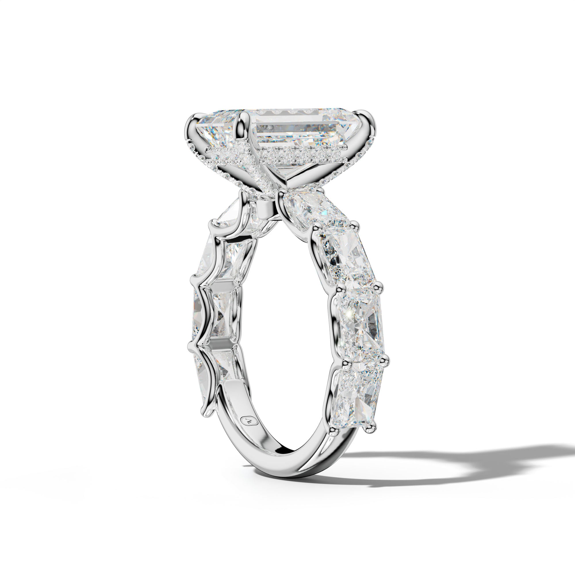 Nancy Emerald Cut Engagement Ring With East West Radiant Side Stones