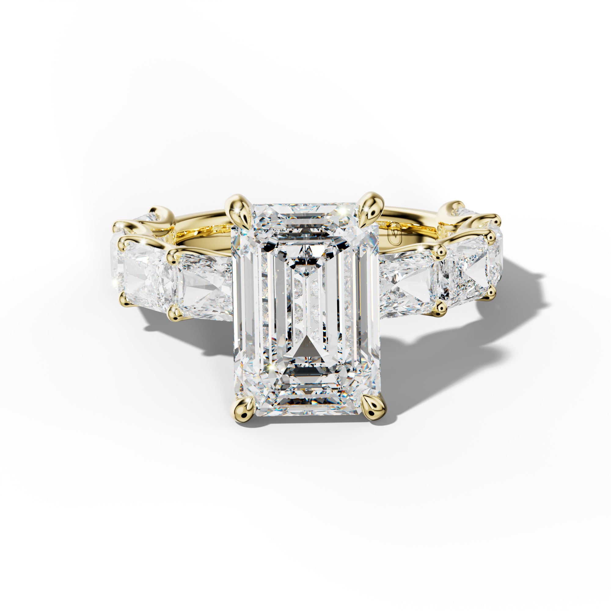 Nancy Emerald Cut Engagement Ring With East West Radiant Side Stones