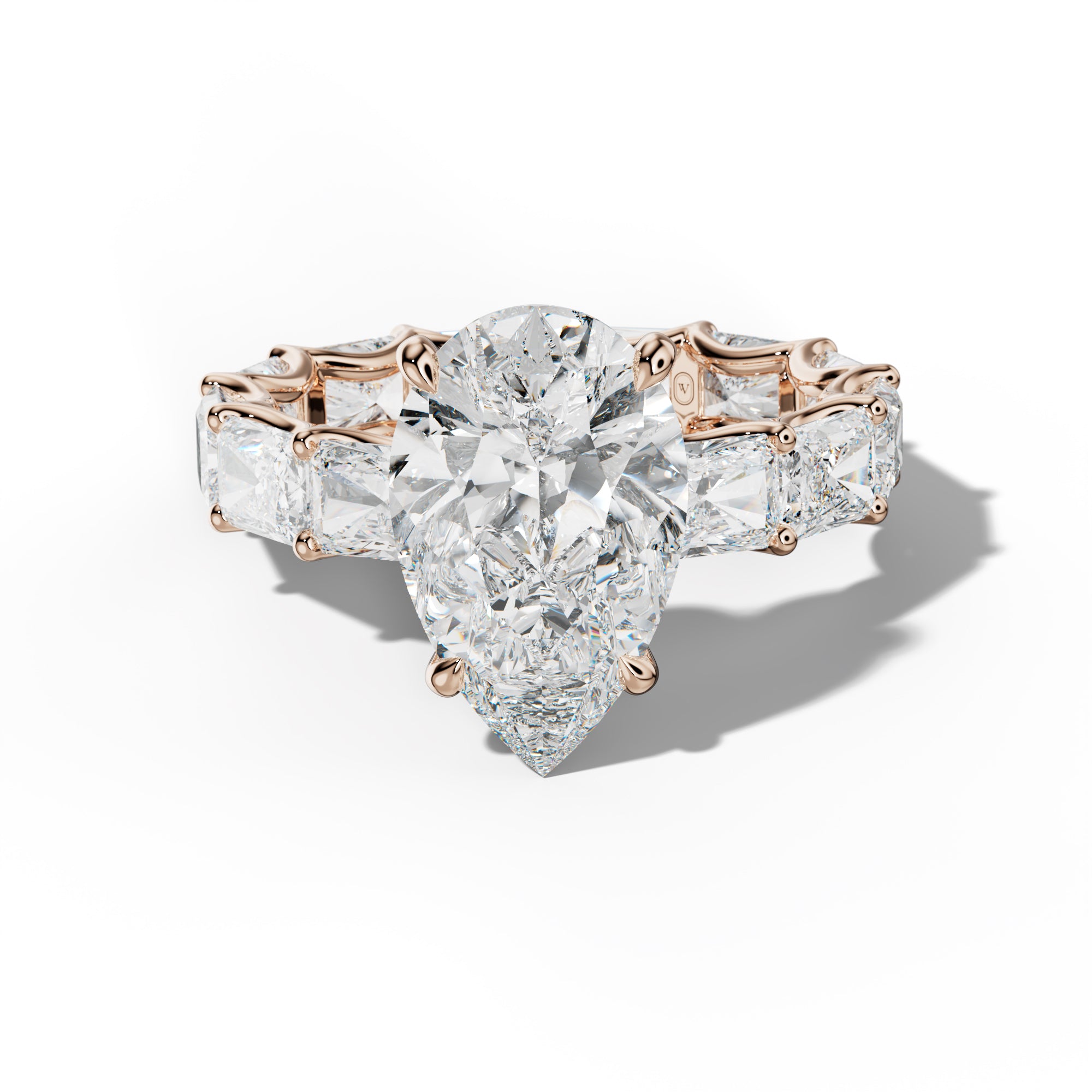 Daphne Pear Shape Engagement Ring With East West Radiant Side Stones
