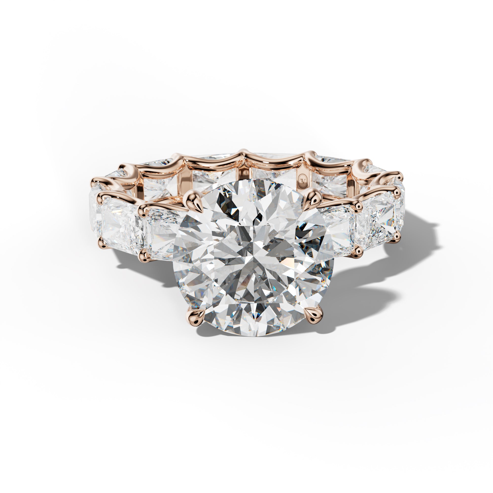 Daphne Round Diamond Engagement Ring With East West Radiant Side Stones