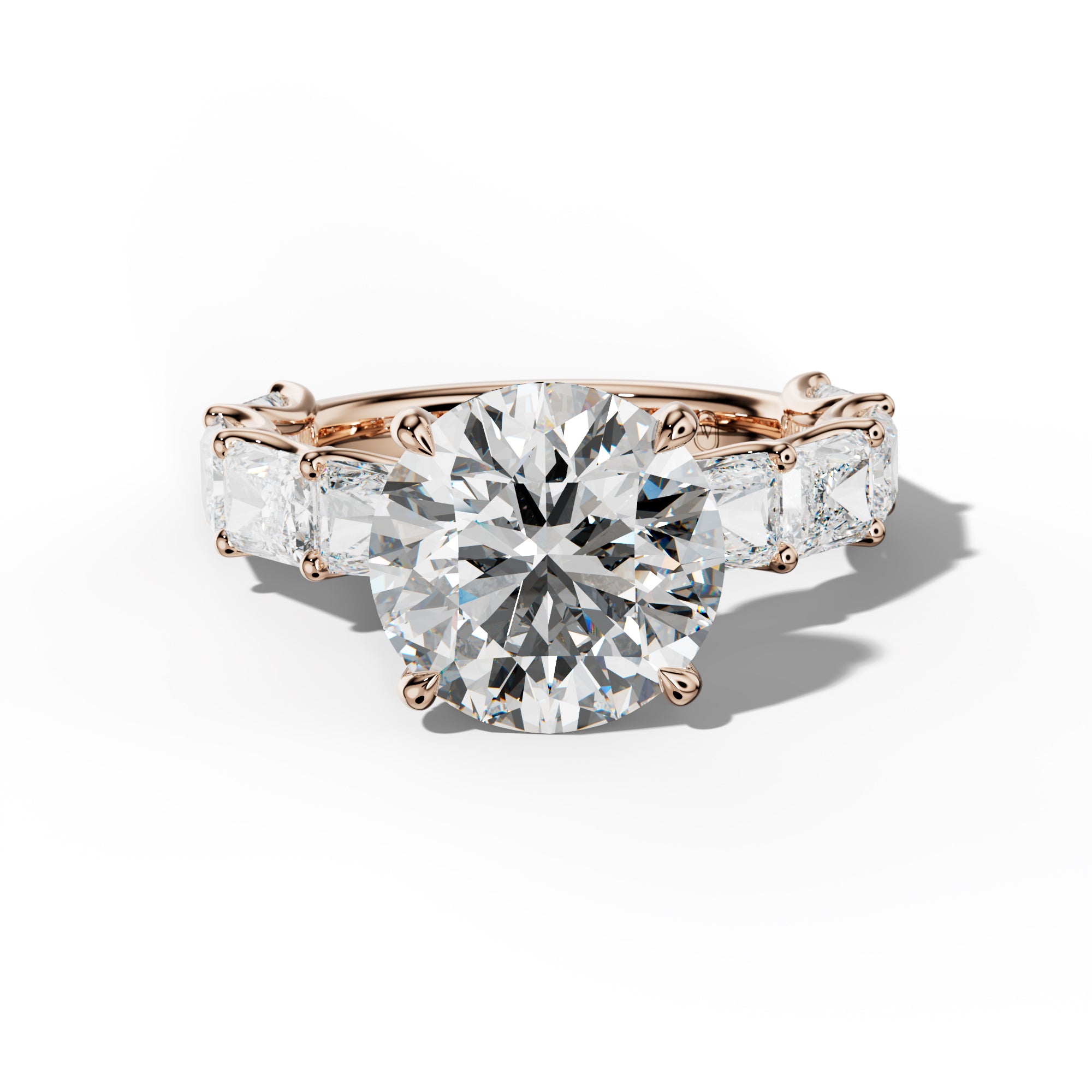 Nancy Round Diamond Engagement Ring With East West Radiant Side Stones