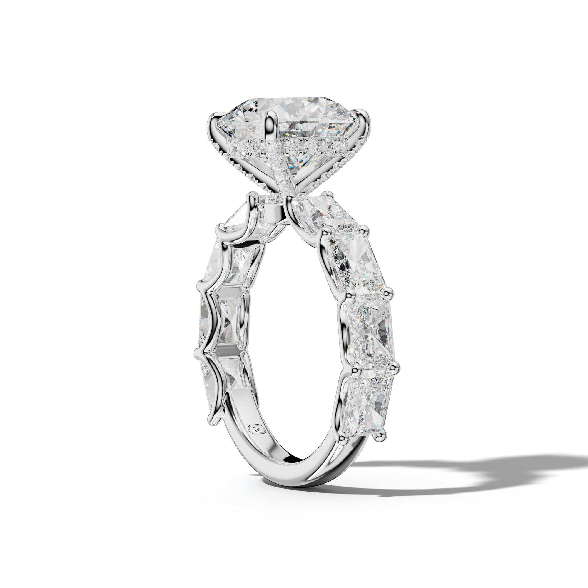 Nancy Round Diamond Engagement Ring With East West Radiant Side Stones