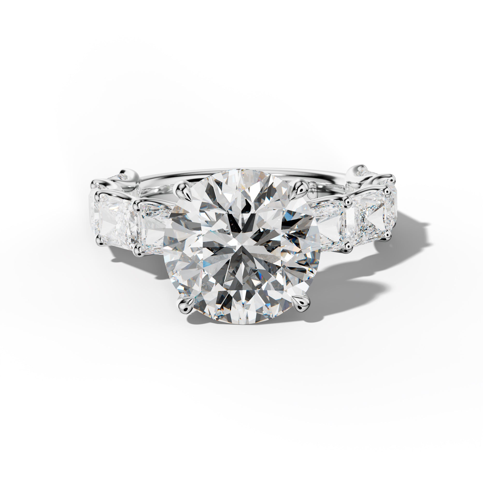 Nancy Round Diamond Engagement Ring With East West Radiant Side Stones