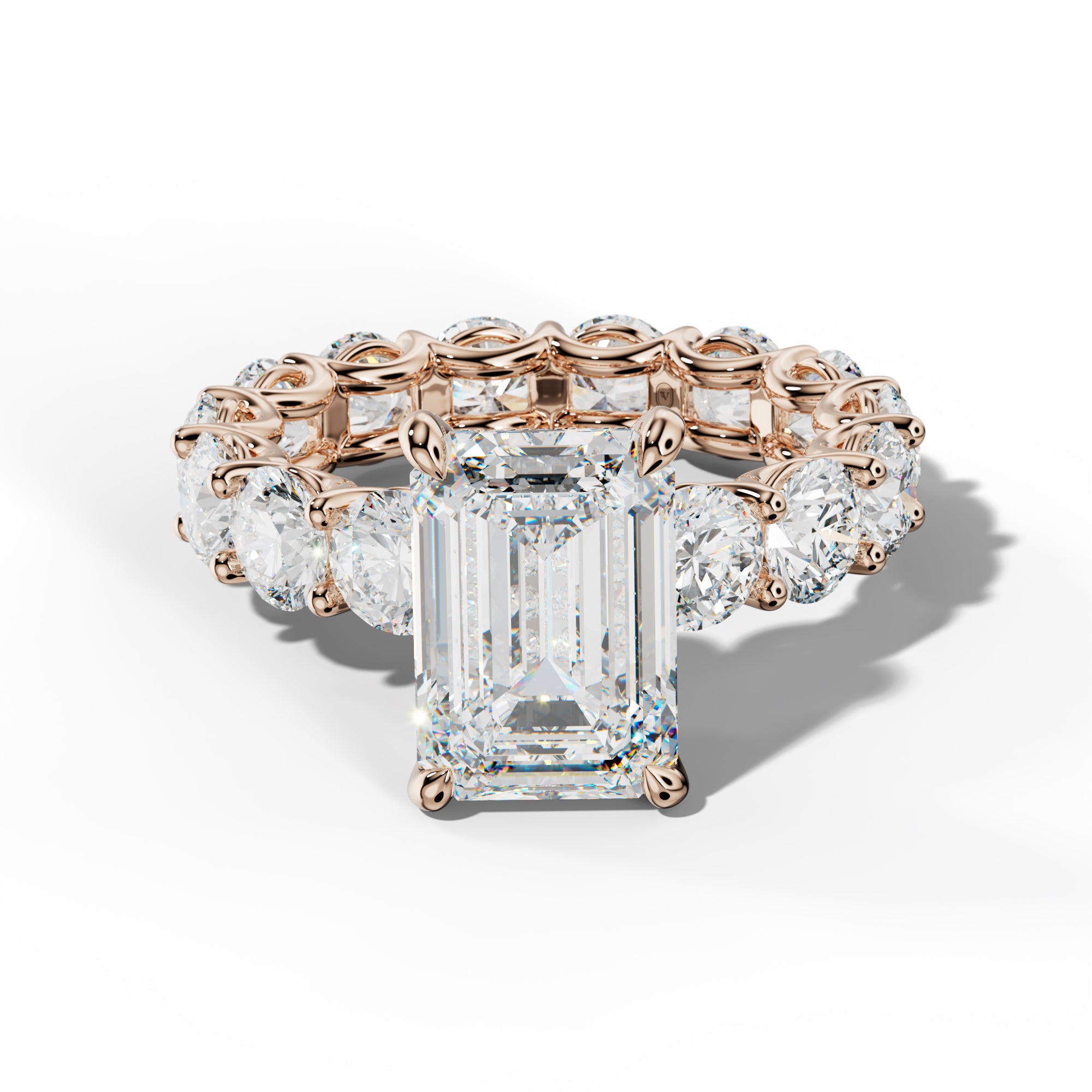 Daisy Emerald Cut Engagement Ring With Round Side Stones