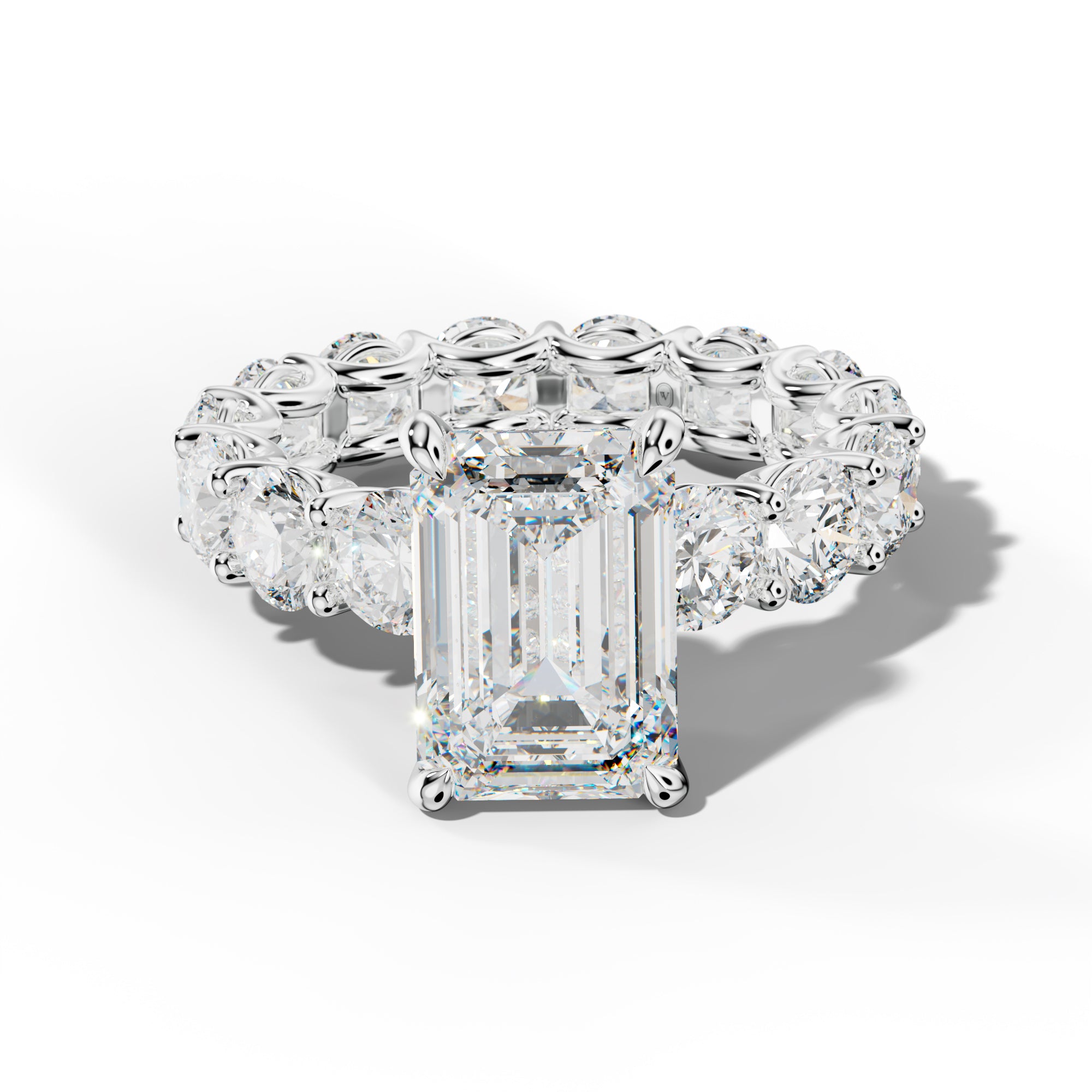 Daisy Emerald Cut Engagement Ring With Round Side Stones