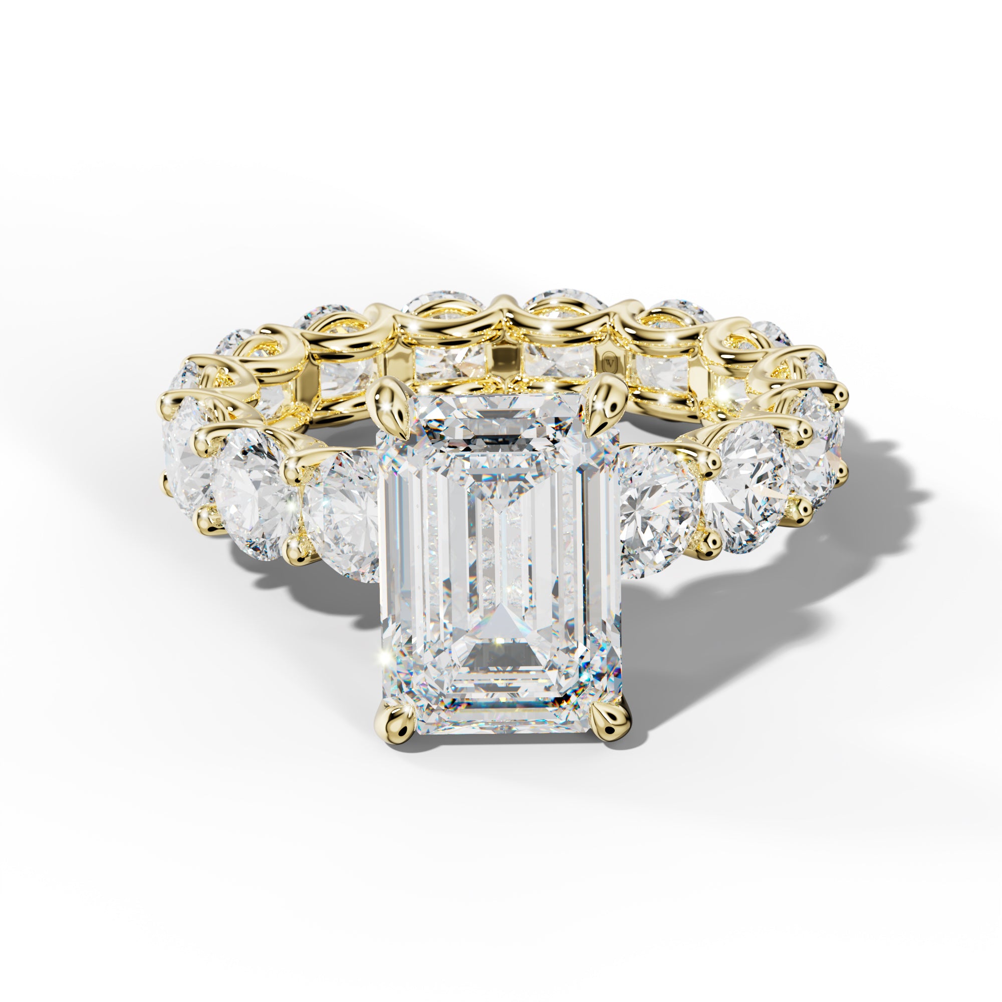 Daisy Emerald Cut Engagement Ring With Round Side Stones