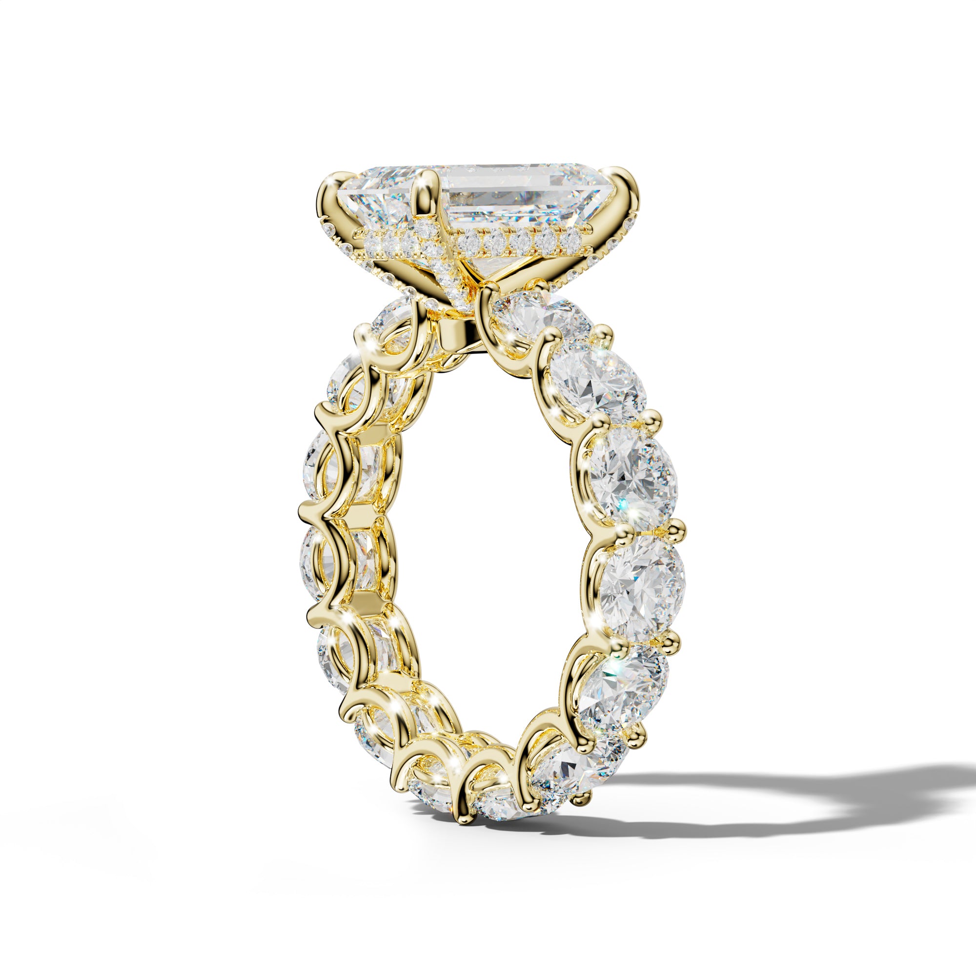 Daisy Emerald Cut Engagement Ring With Round Side Stones