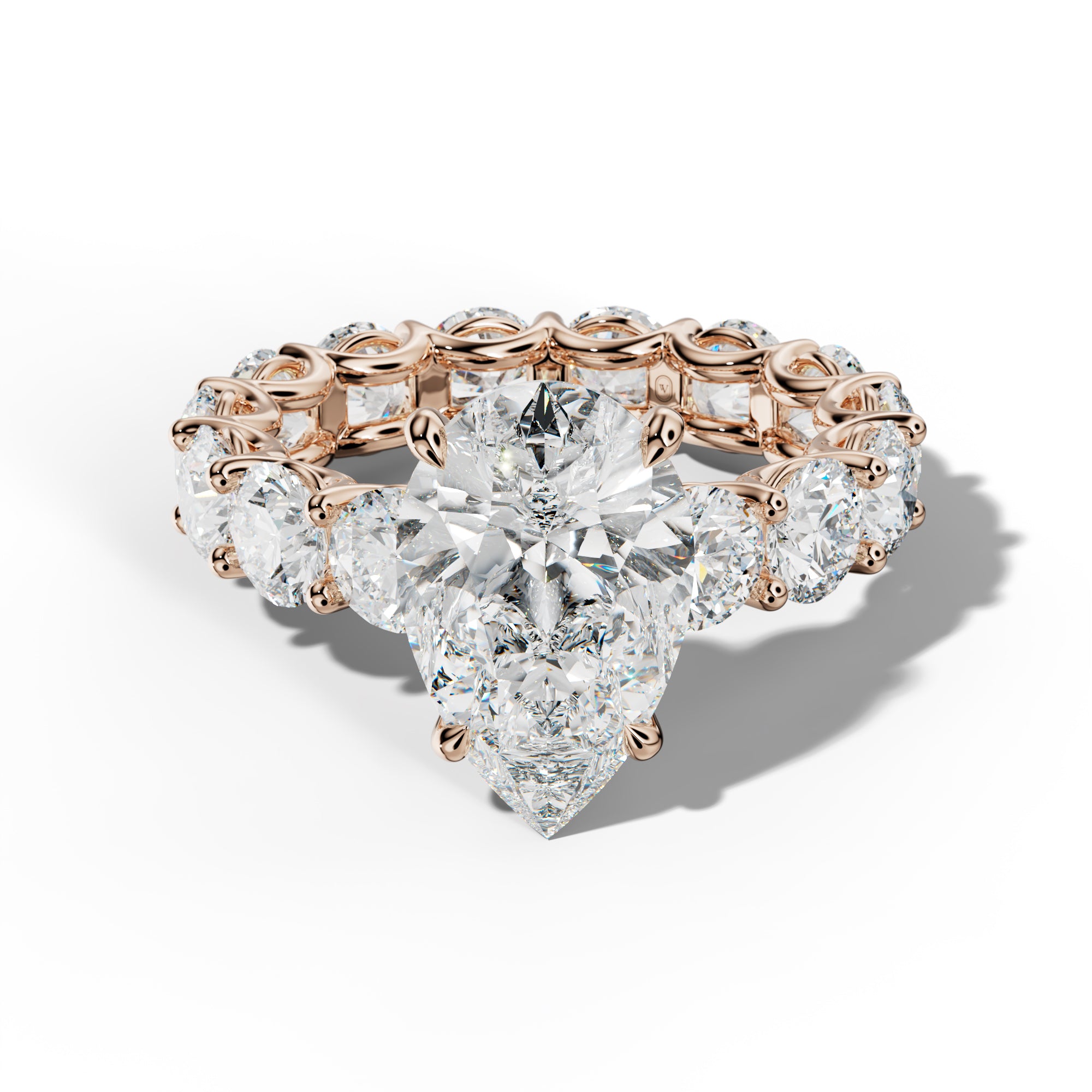 Daisy Pear Shape Engagement Ring With Round Side Stones