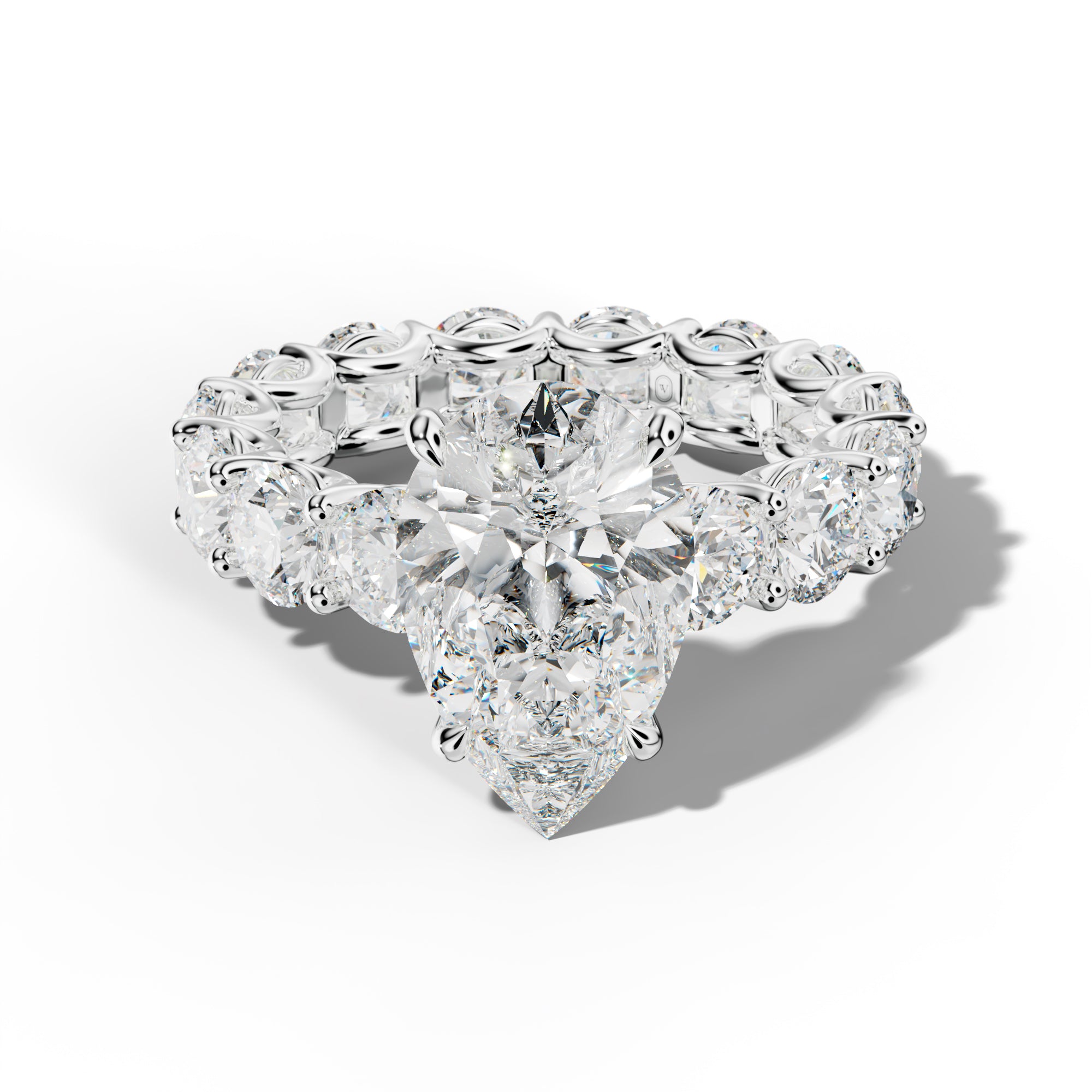 Daisy Pear Shape Engagement Ring With Round Side Stones