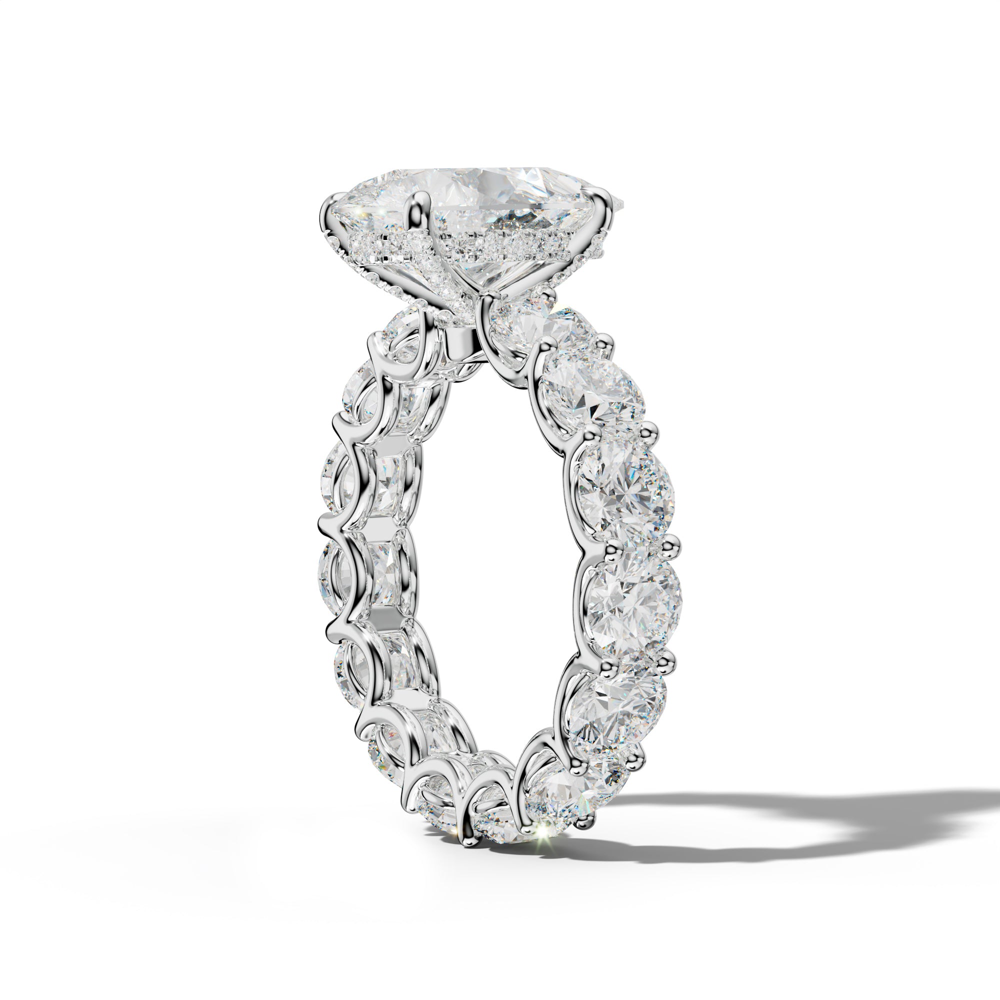 Daisy Pear Shape Engagement Ring With Round Side Stones