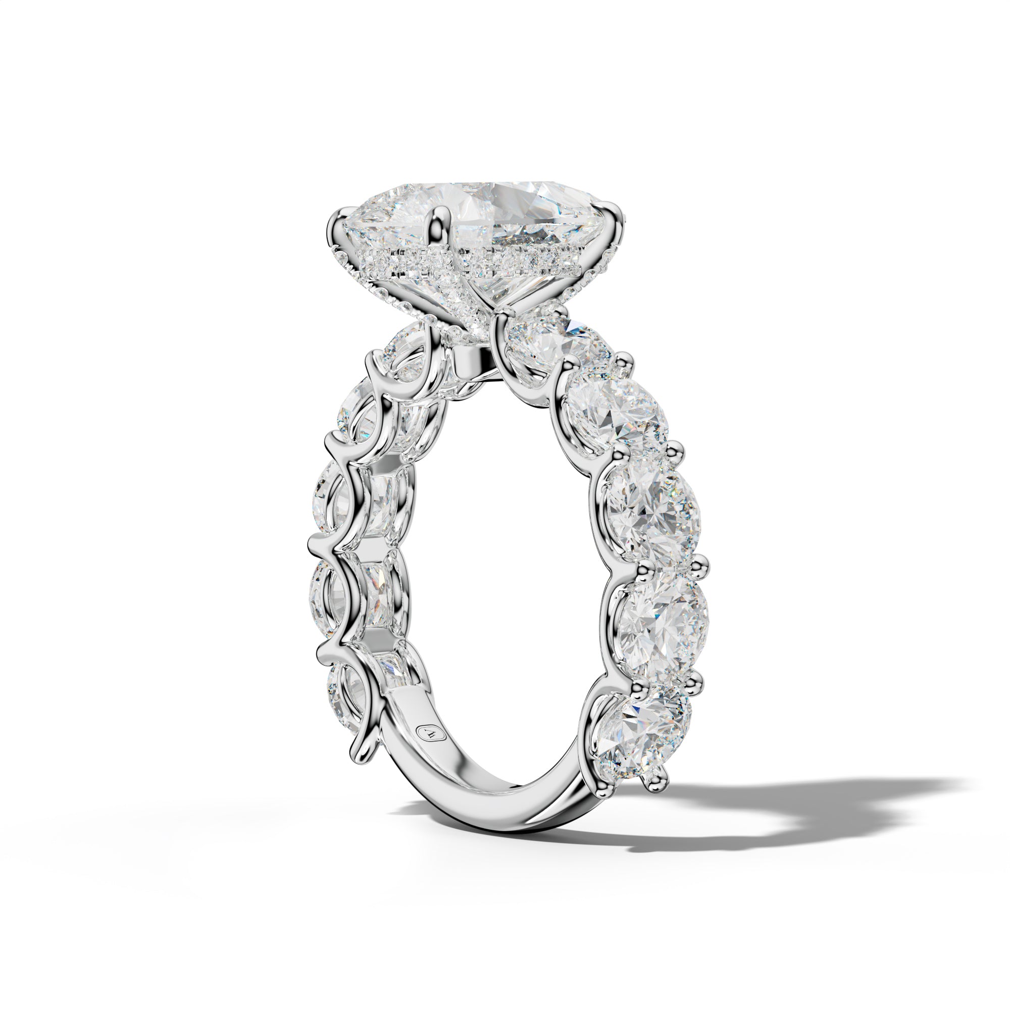 Josie Pear Shape Engagement Ring With Round Side Stones