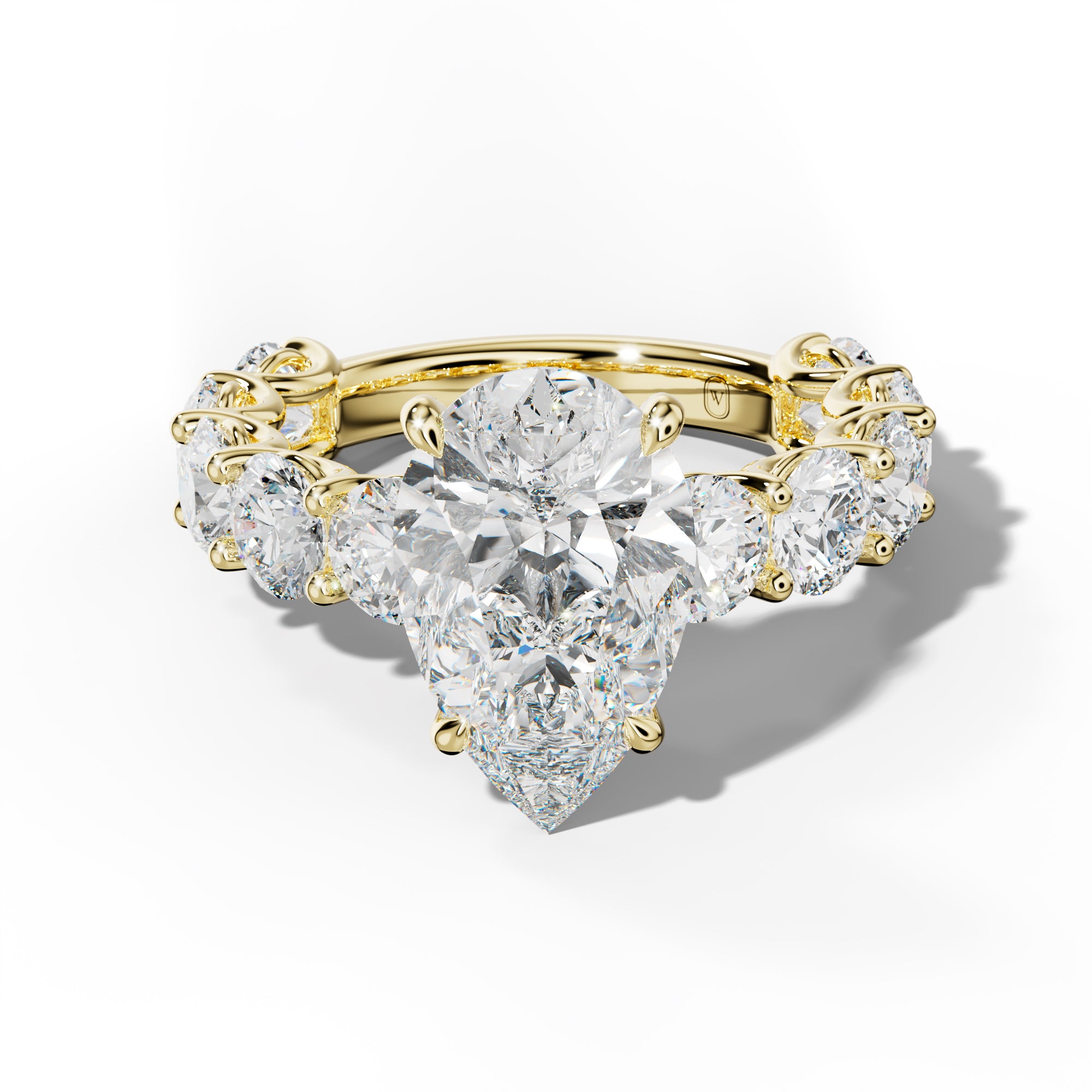 Josie Pear Shape Engagement Ring With Round Side Stones