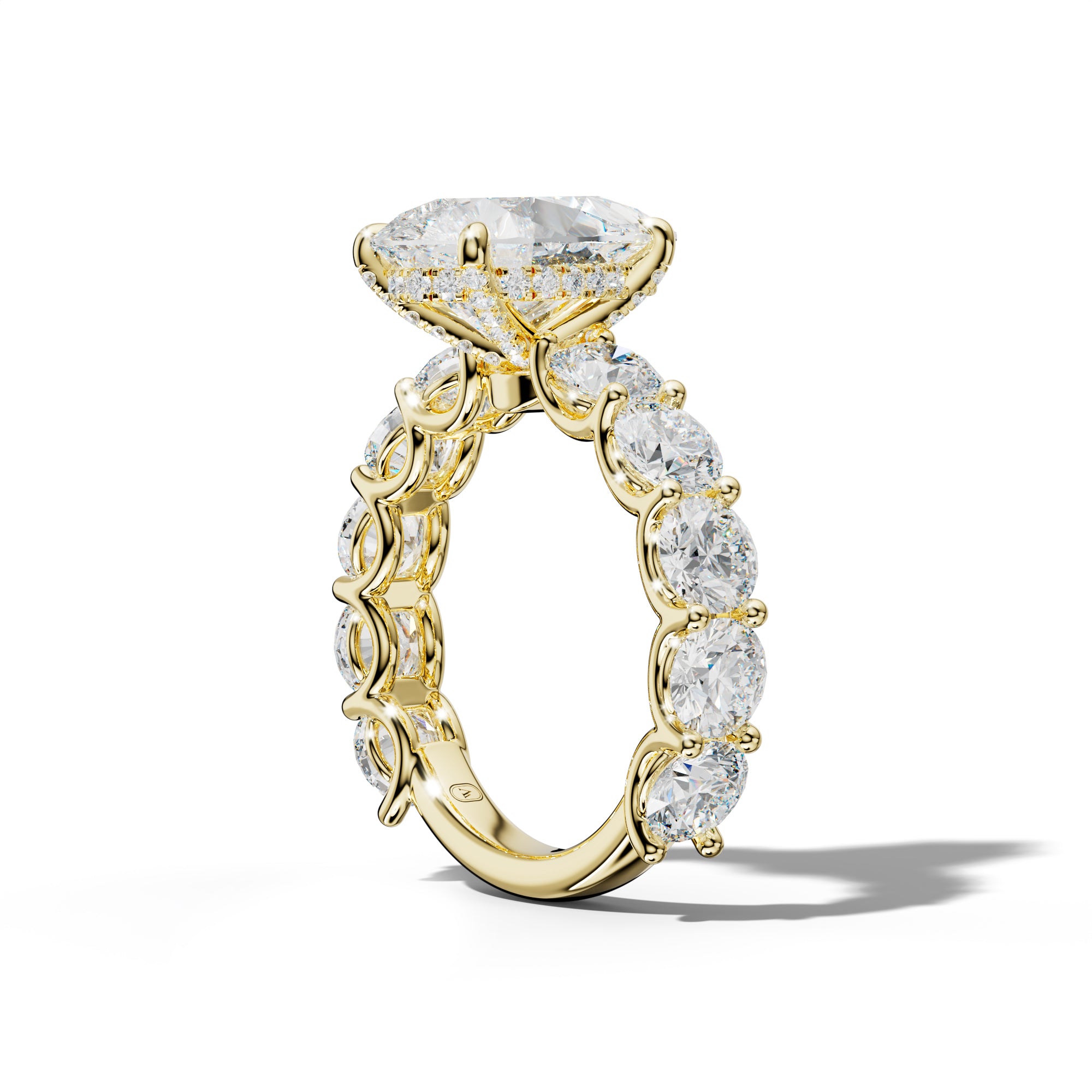Josie Pear Shape Engagement Ring With Round Side Stones