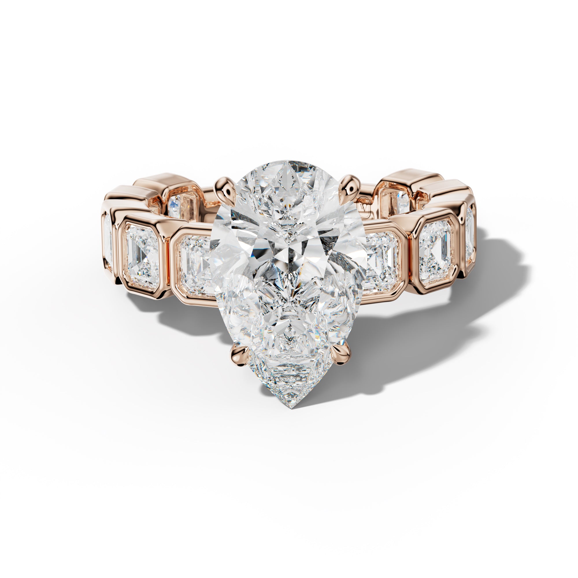 Reina Pear Shape Engagement Ring With Asscher Side Stones