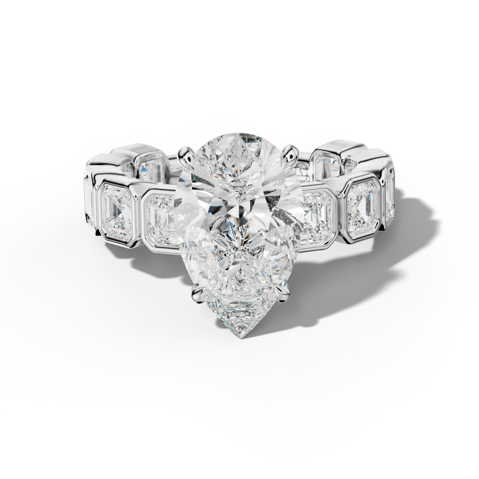Reina Pear Shape Engagement Ring With Asscher Side Stones