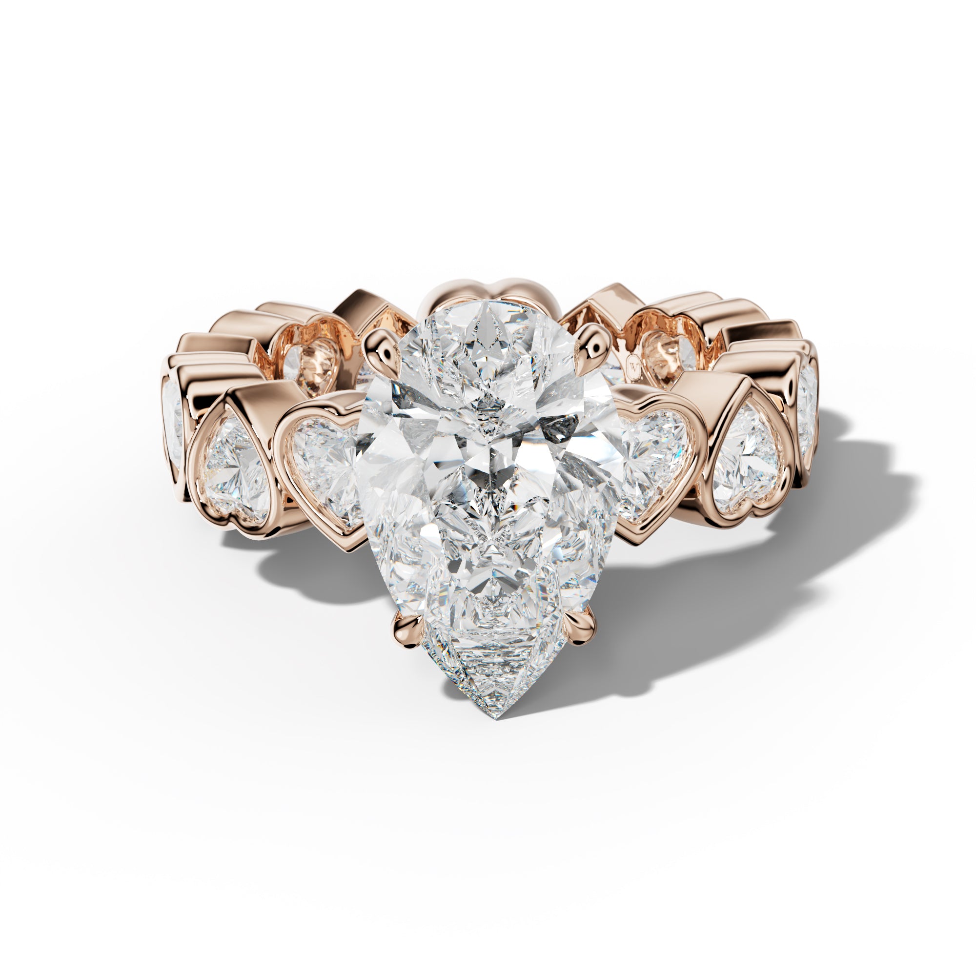 Stevie Pear Shape Engagement Ring With Heart Side Stones