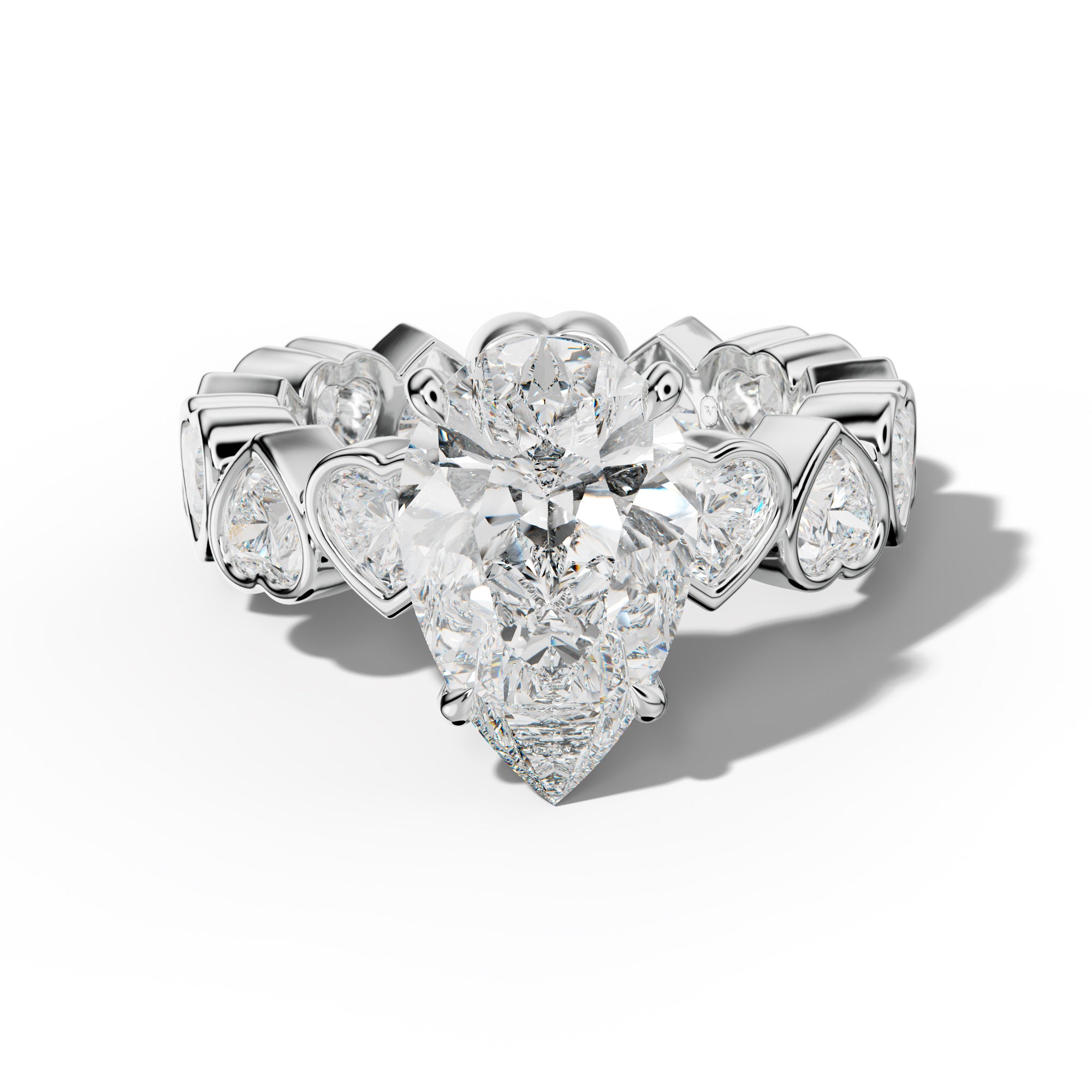Stevie Pear Shape Engagement Ring With Heart Side Stones