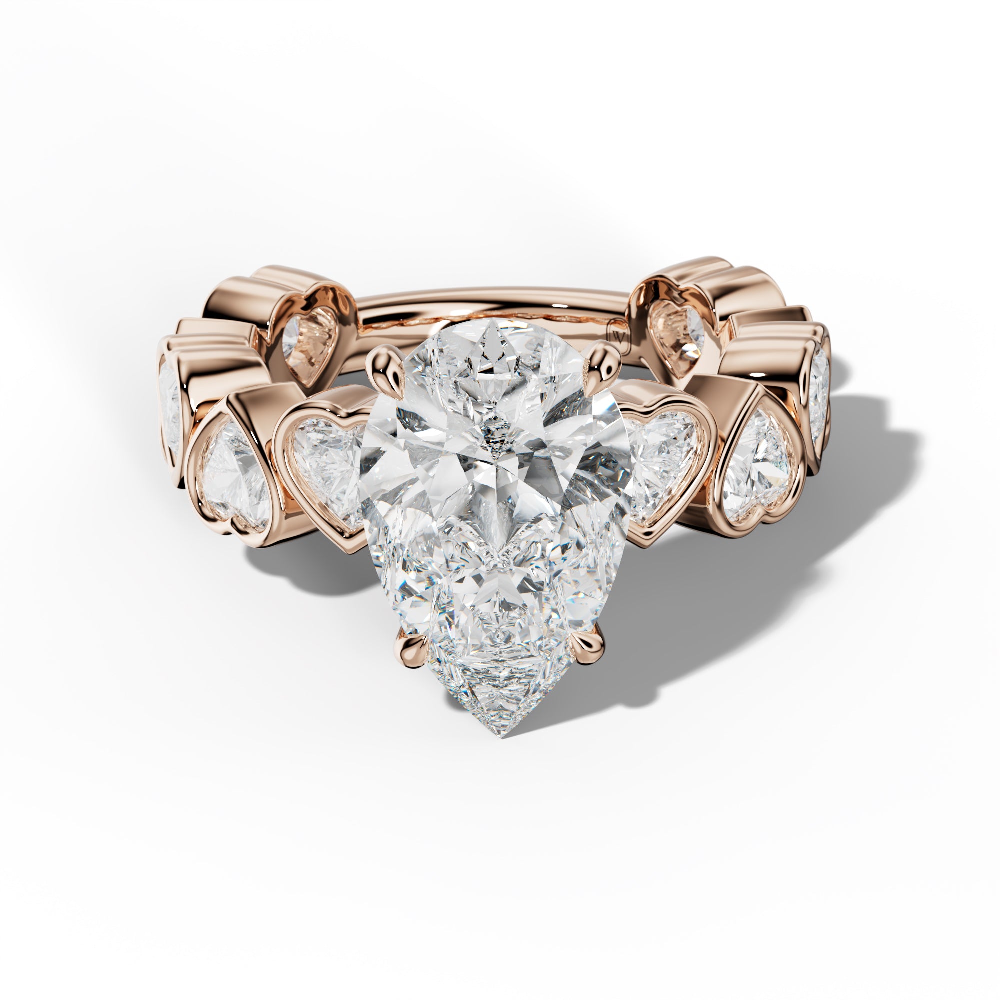 Antonella Pear Shape Engagement Ring With Heart Side Stones