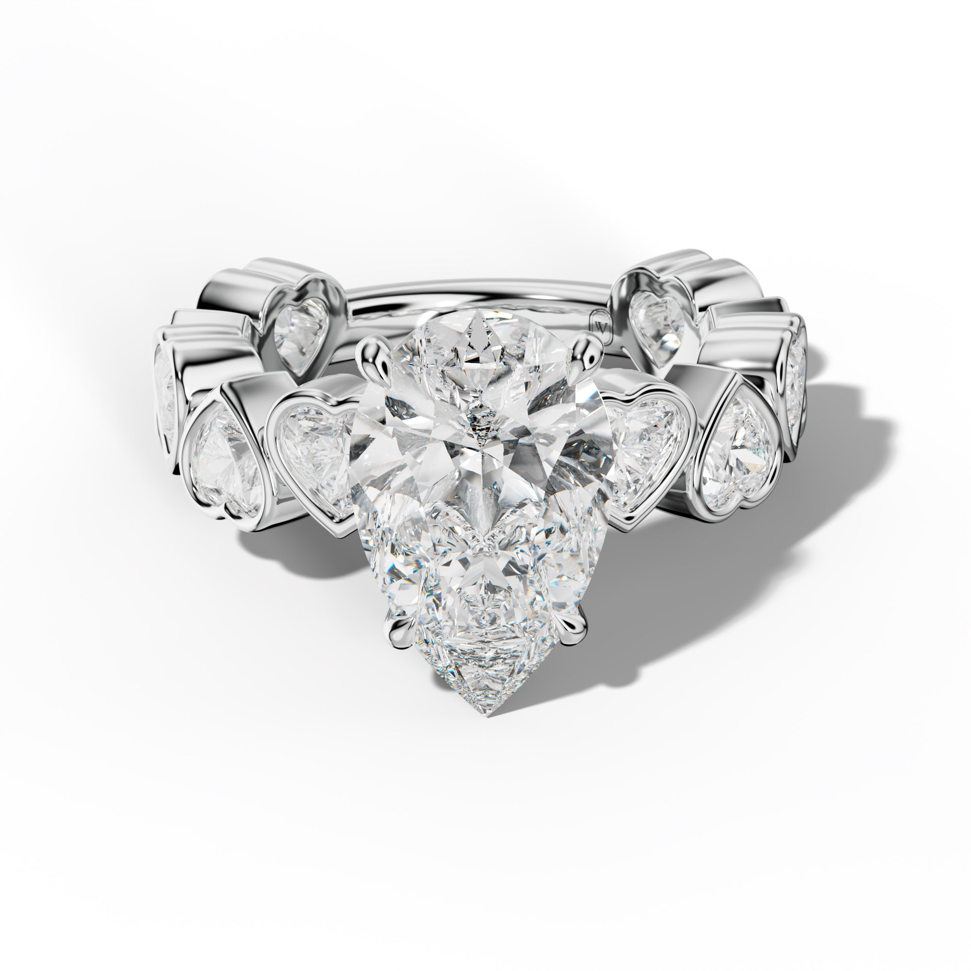 Antonella Pear Shape Engagement Ring With Heart Side Stones