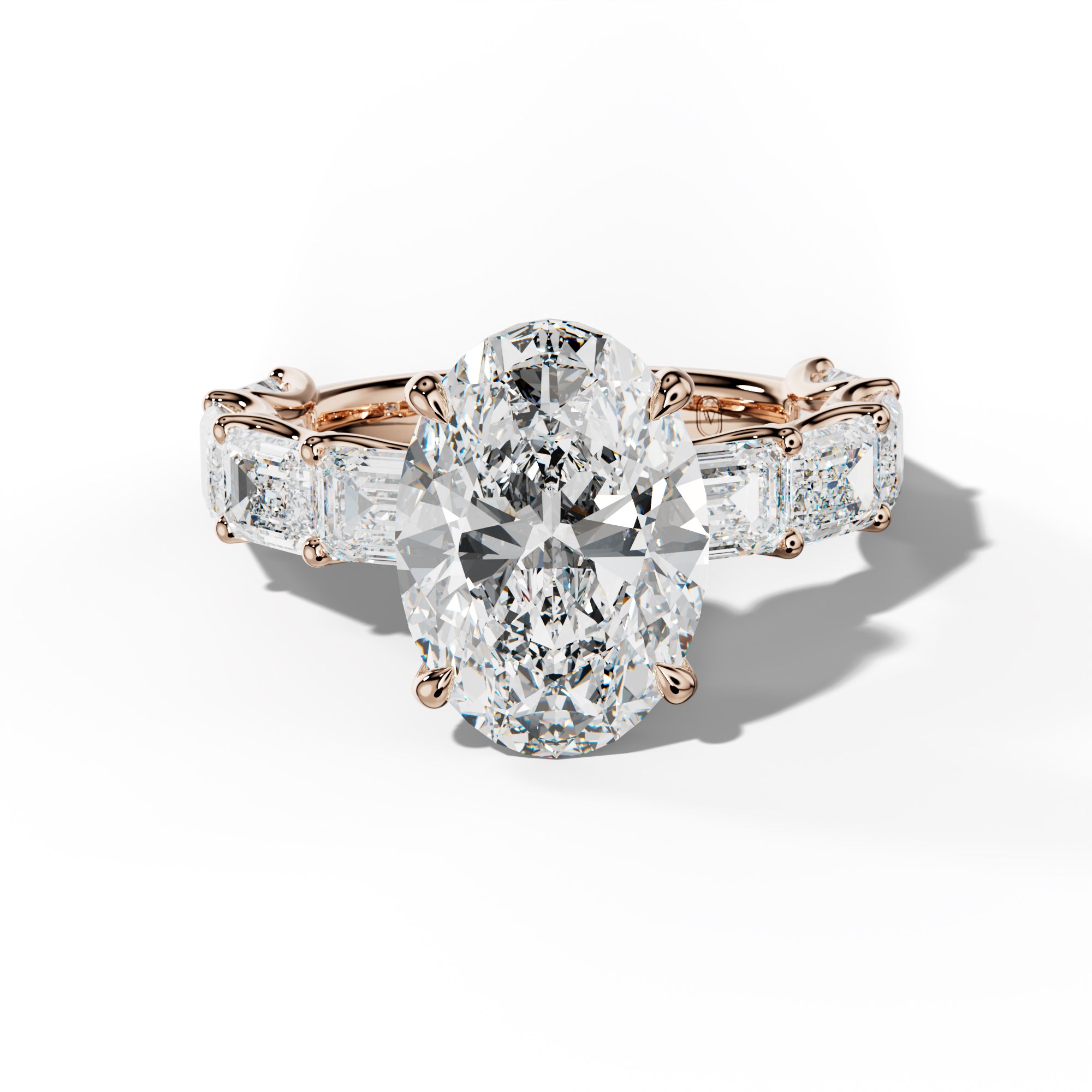 Oaklynn Oval Diamond Engagement Ring With East West Emerald Side Stones