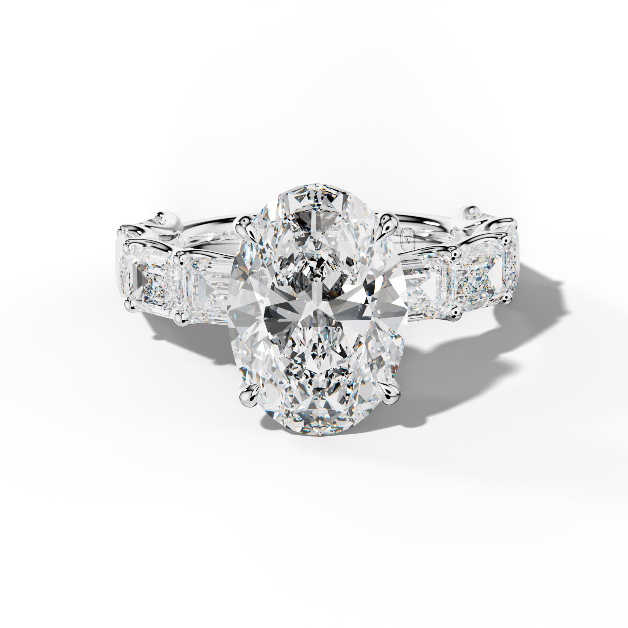 Oaklynn Oval Diamond Engagement Ring With East West Emerald Side Stones